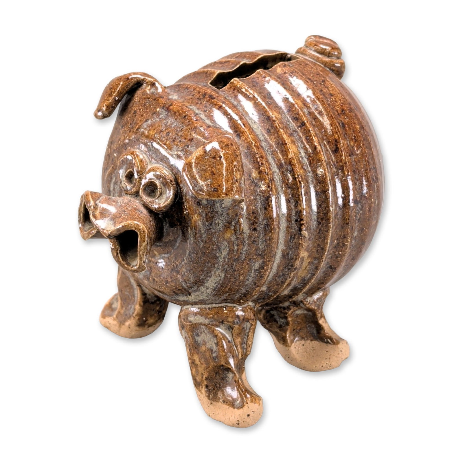 American Folk Art Stoneware Pig Bank: American folk art stoneware pig bank featuring a bulbous wheel-thrown body with horizontal ribbing. The form includes four tapering legs, a small coiled tail, and applied ears. Facial details consist 