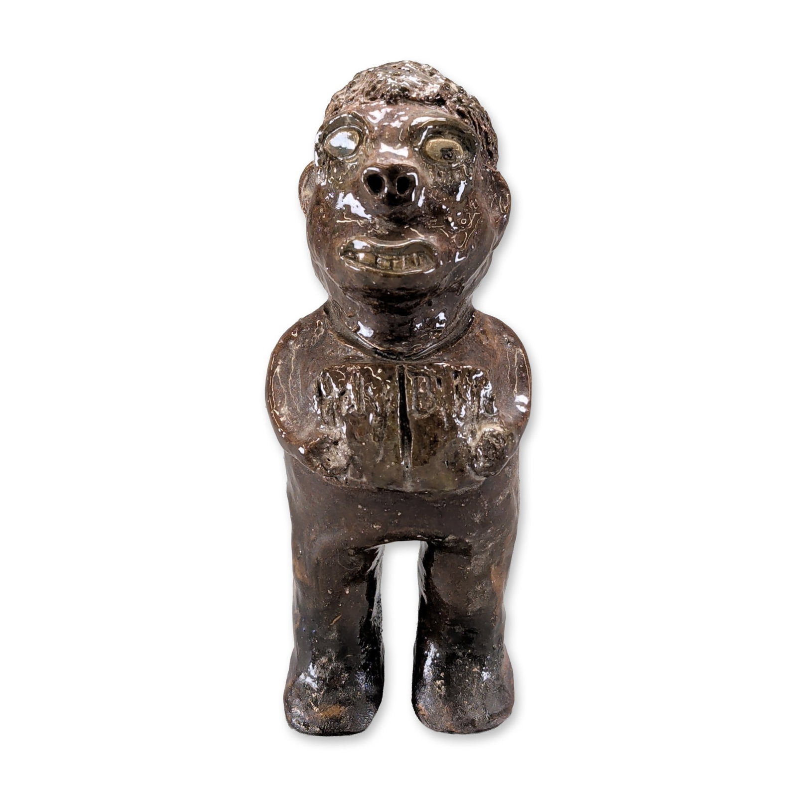 Marie Rogers Pottery Georgia Folk Figurine: A folk art anthropomorphic figurine in glazed stoneware, featuring a squat, stylized humanoid form with an oversized head. The figure is modeled with prominent facial features including large eyes, a 