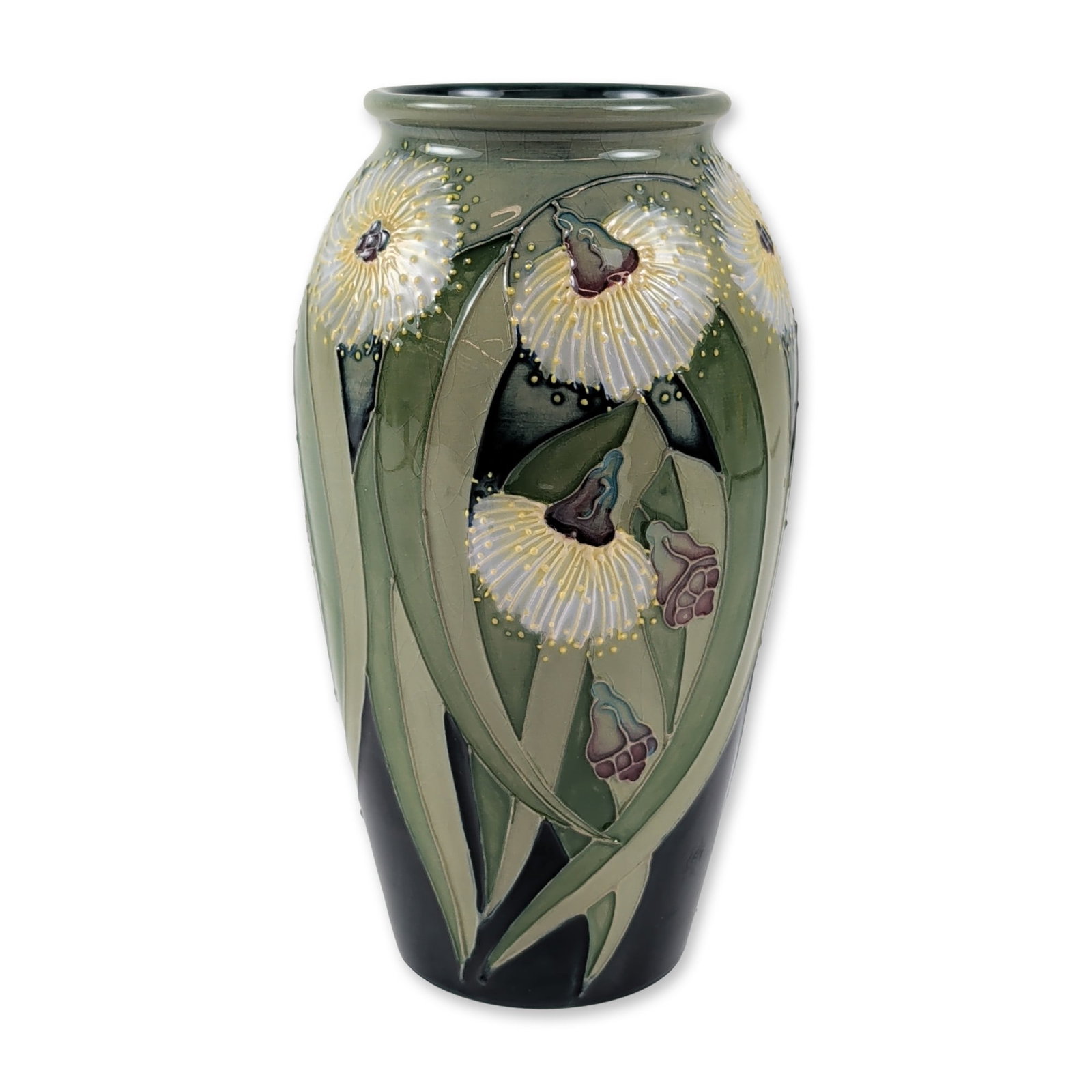 Moorcroft Tasmanian Blue Gum Limited Edition Vase: Moorcroft pottery vase in the Tasmanian Blue Gum pattern, designed by Sally Tuffin. The tapered ovoid earthenware form features tubelined decoration of eucalyptus blossoms and slender leaves. The hand