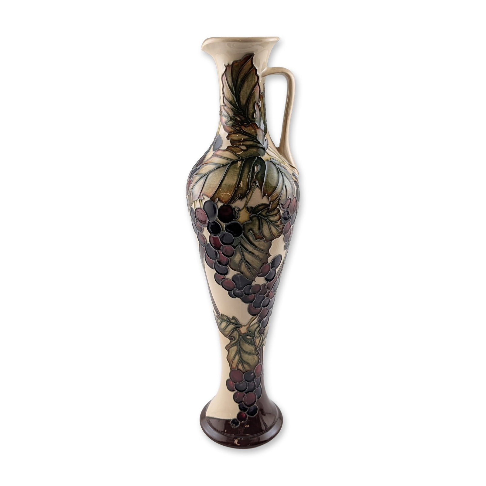 Moorcroft Vicky Lovatt Grapevine Ceramic Ewer, Signed: Moorcroft earthenware ewer in the Grapevine pattern, designed by Vicky Lovatt. The tall, slender vessel features a flared rim, narrow neck, and single applied handle. The body is decorated with tube-l