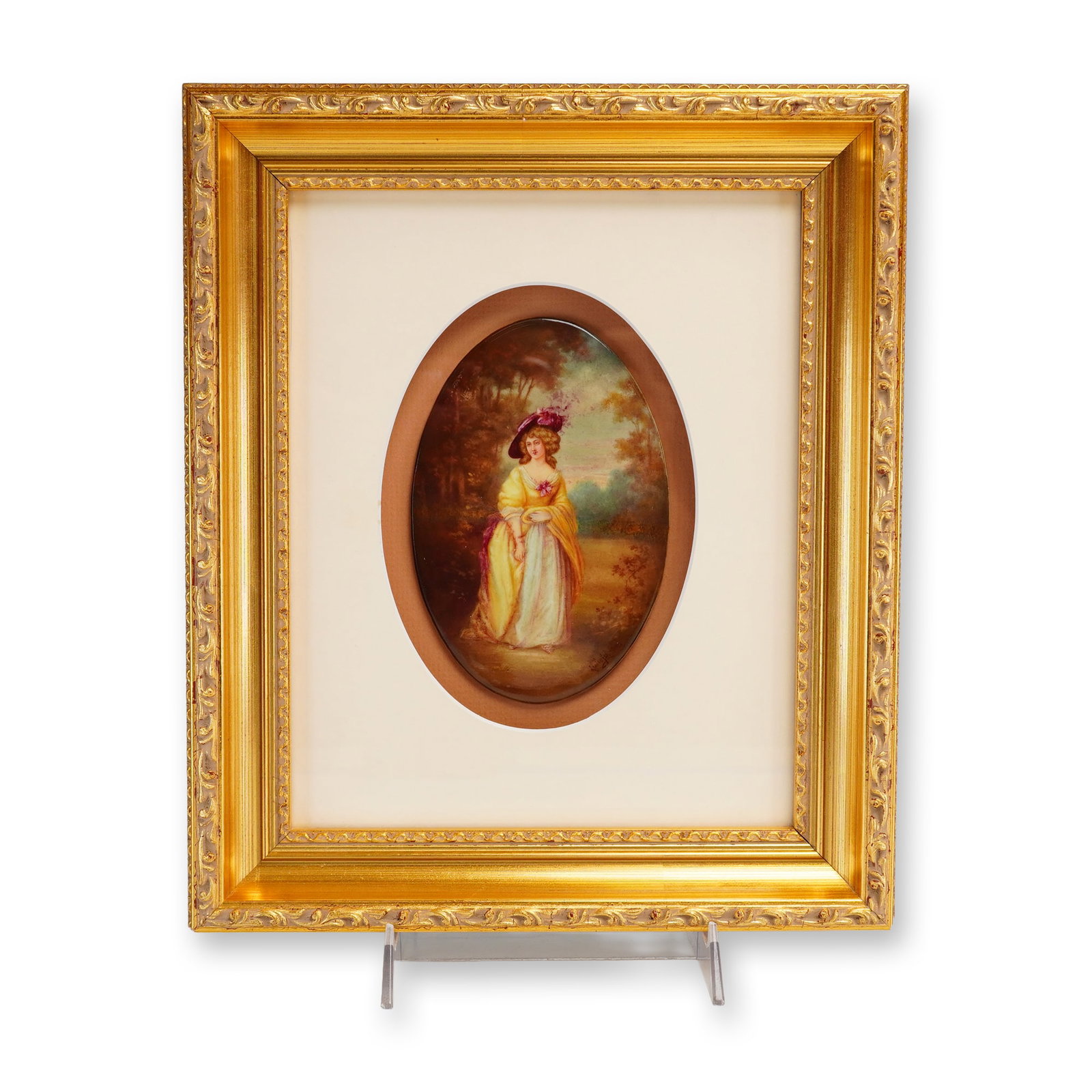 Framed Leslie Johnson Hand-Painted Plaque, Portrait of a Young Lady: An oval Royal Doulton porcelain plaque featuring a hand-painted portrait of a young lady, signed by the artist Leslie Johnson. The subject is depicted in 18th-century period costume, wearing a volumin