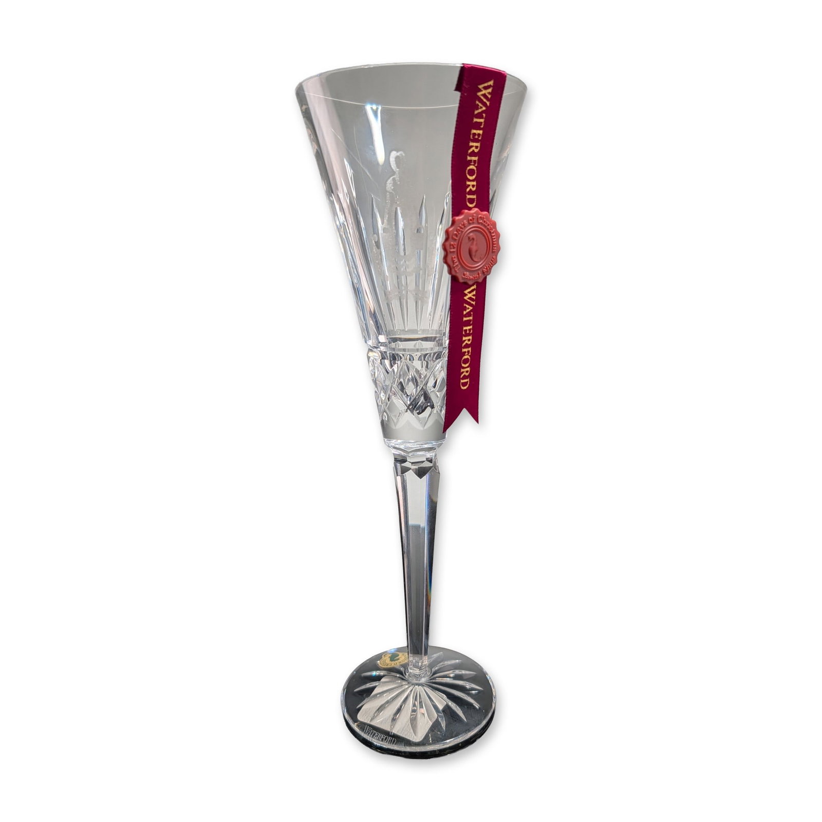 Waterford Crystal 12 Days of Christmas Fluted Champagne, Eight Maids A-Milking: An Irish lead crystal champagne flute by Waterford, part of the 8th Edition of The 12 Days of Christmas Collection featuring the Eight Maids-a-Milking motif. The tapered bowl displays a frosted etchin