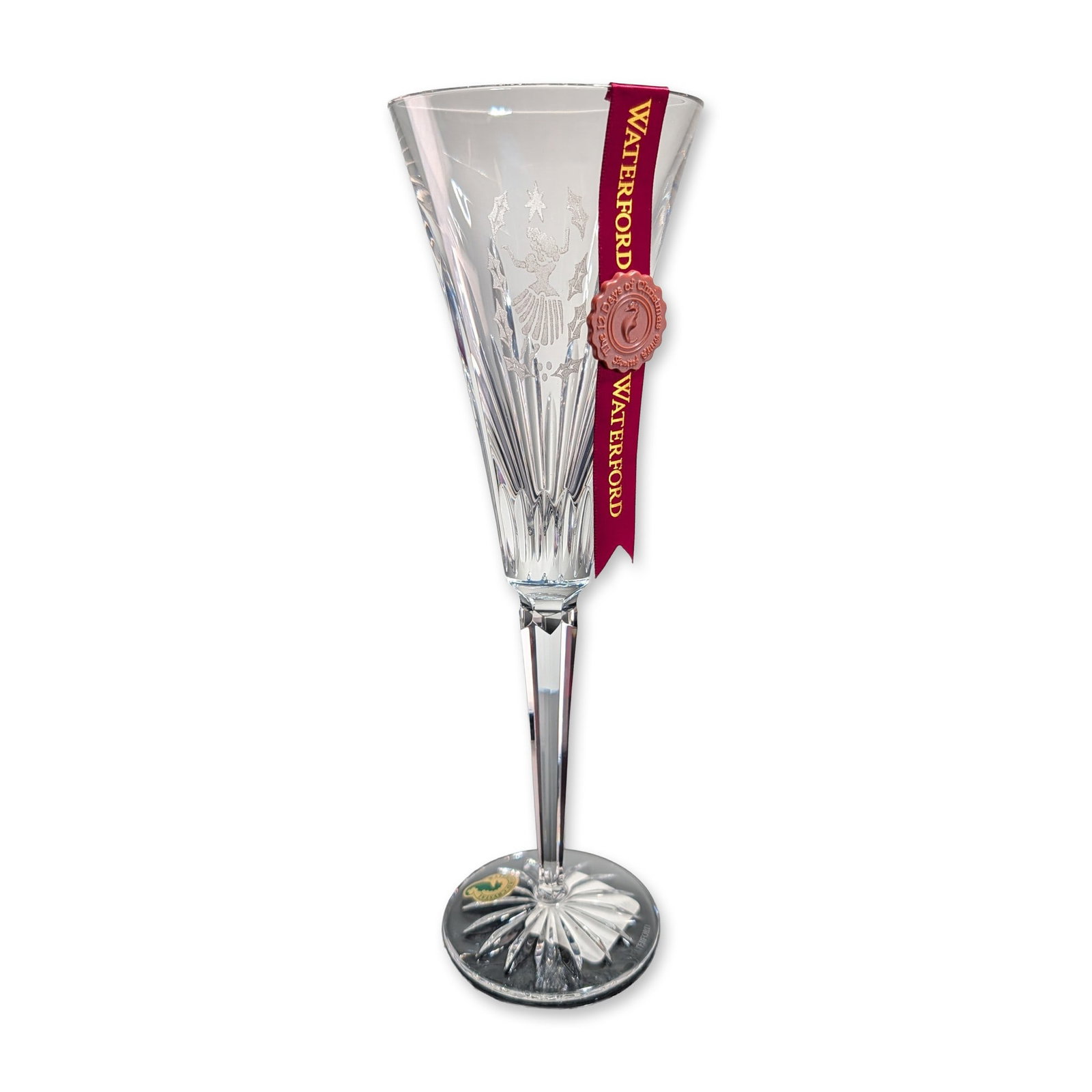 Waterford Crystal 12 Days of Christmas Fluted Champagne, Nine Ladies Dancing: Waterford lead crystal champagne flute, 9th edition from The 12 Days of Christmas Collection accompanied by a matching charm. The trumpet-shaped bowl features intaglio engraving depicting a dancing la