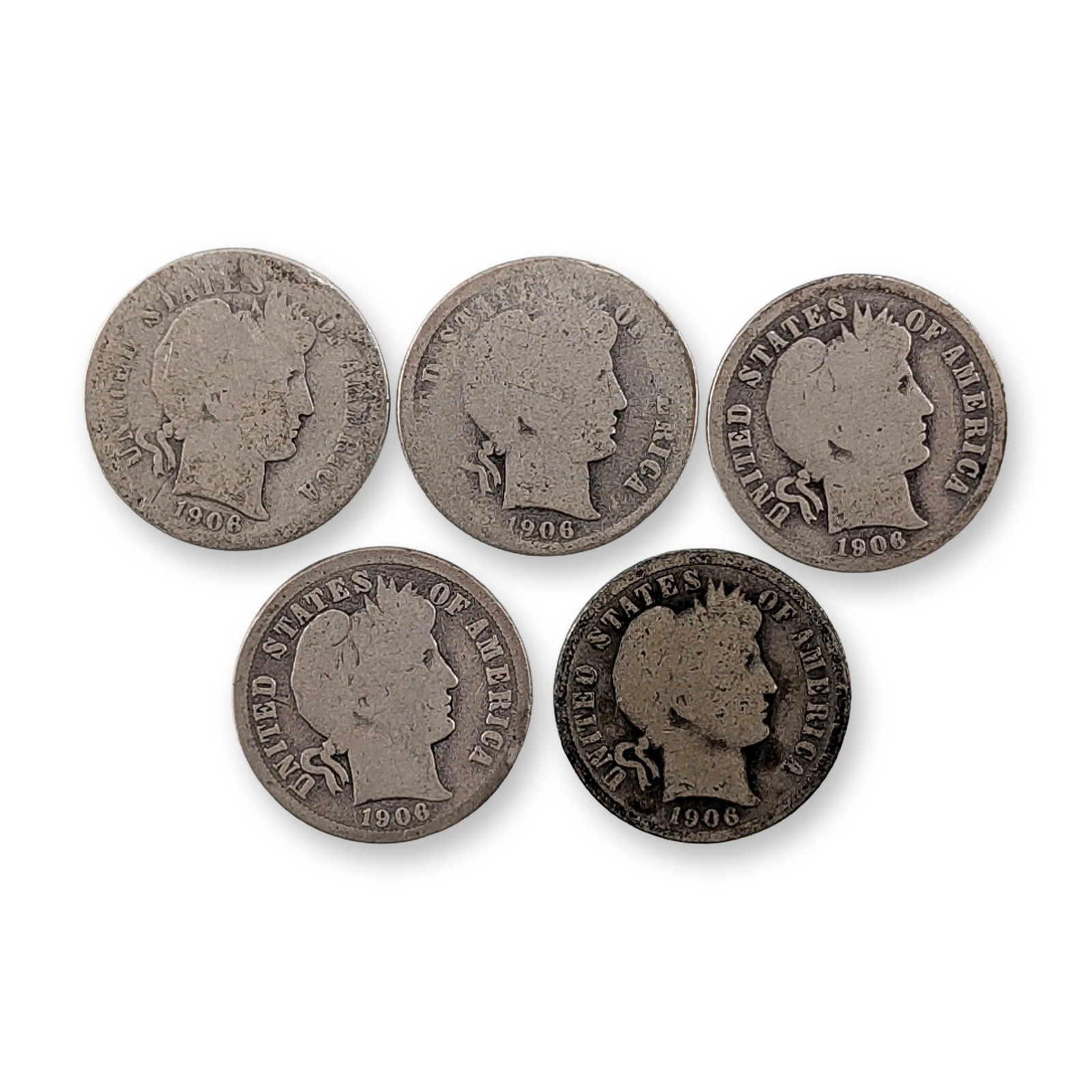 5pc 1906 & 1906-D US Barber Silver Dime Coins: Group of five US silver dimes in the Barber design, all bearing the date 1906. Each coin is composed of 90 percent silver and 10 percent copper. One specimen features a small, impressed D mint mark at