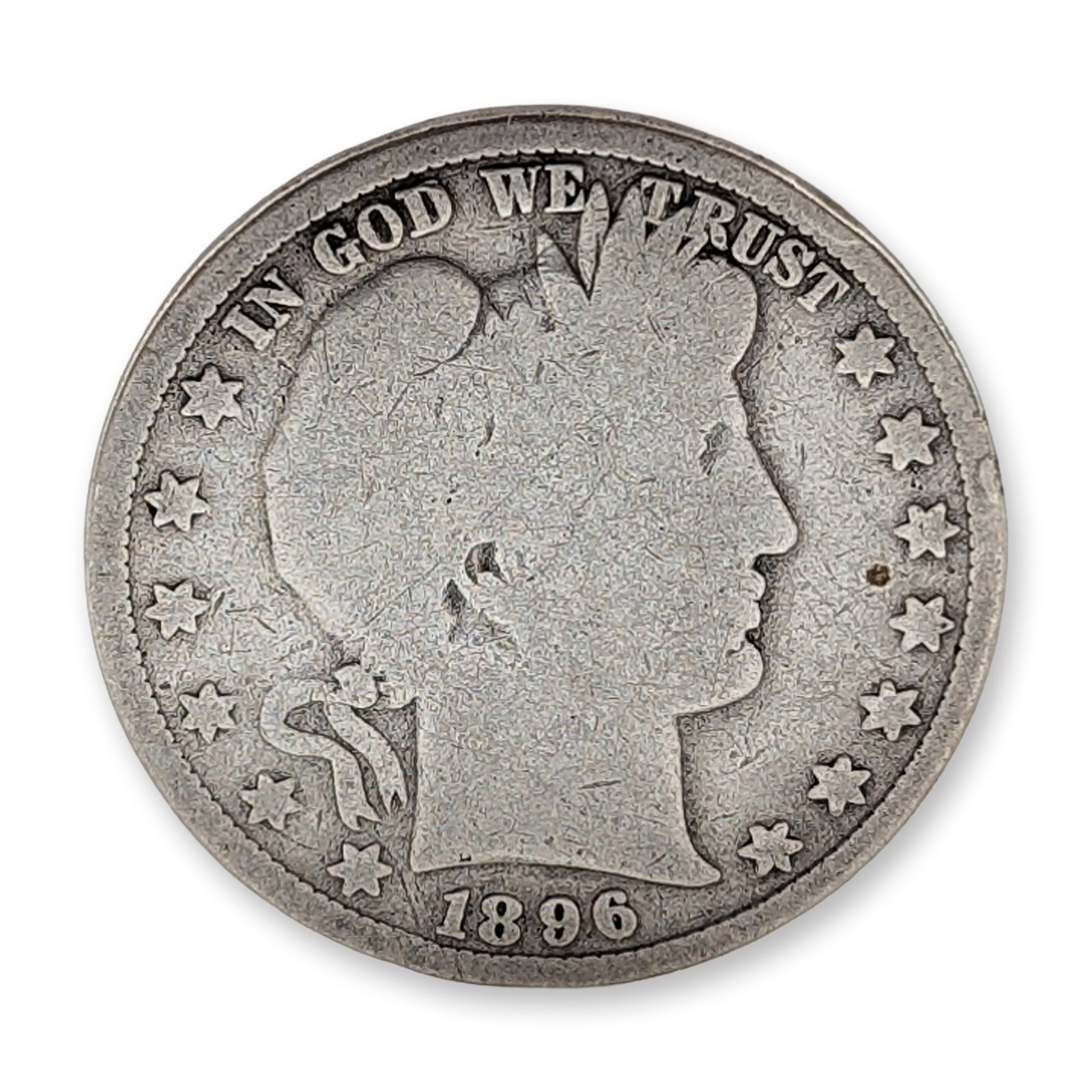 1896 US Barber Silver Half Dollar Coin: US 1896 Barber half dollar in 90% silver, featuring the Liberty head design by Charles E. Barber. The obverse includes the legend IN GOD WE TRUST and thirteen stars, with the date 1896 at the base. Th