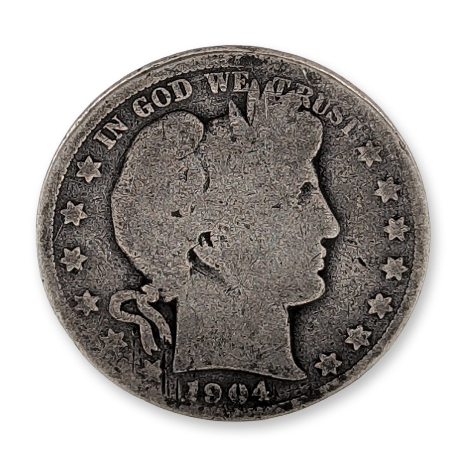 1904 US Barber Silver Half Dollar Coin: 1904 US Barber half quarter dollar composed of 90 percent silver and 10 percent copper. The obverse features a right-facing profile of Liberty wearing a Phrygian cap and laurel wreath, with the inscri