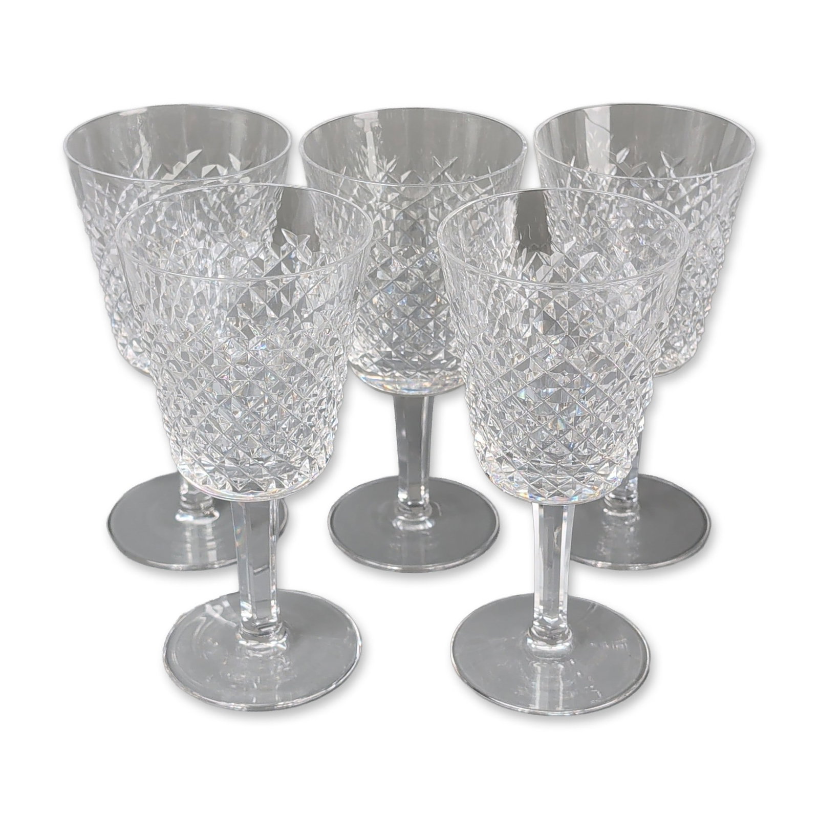 5pc Waterford Lismore Crystal Goblets: Set of five lead crystal wine or water goblets in the Lismore pattern by Waterford. Each vessel features hand-cut decoration consisting of a band of diamond wedge cuts positioned above deep vertical w