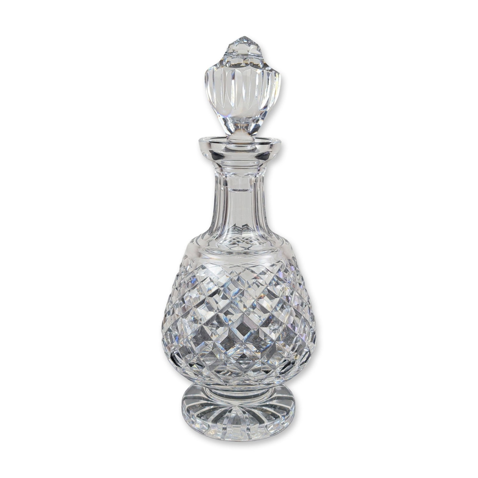 Waterford Crystal Alana Brandy Decanter: A clear cut crystal brandy or spirits decanter in the Alana pattern, characterized by a bulbous body with deep hand-cut diamond lattice patterns. The tapered neck features vertical fluting and flares 