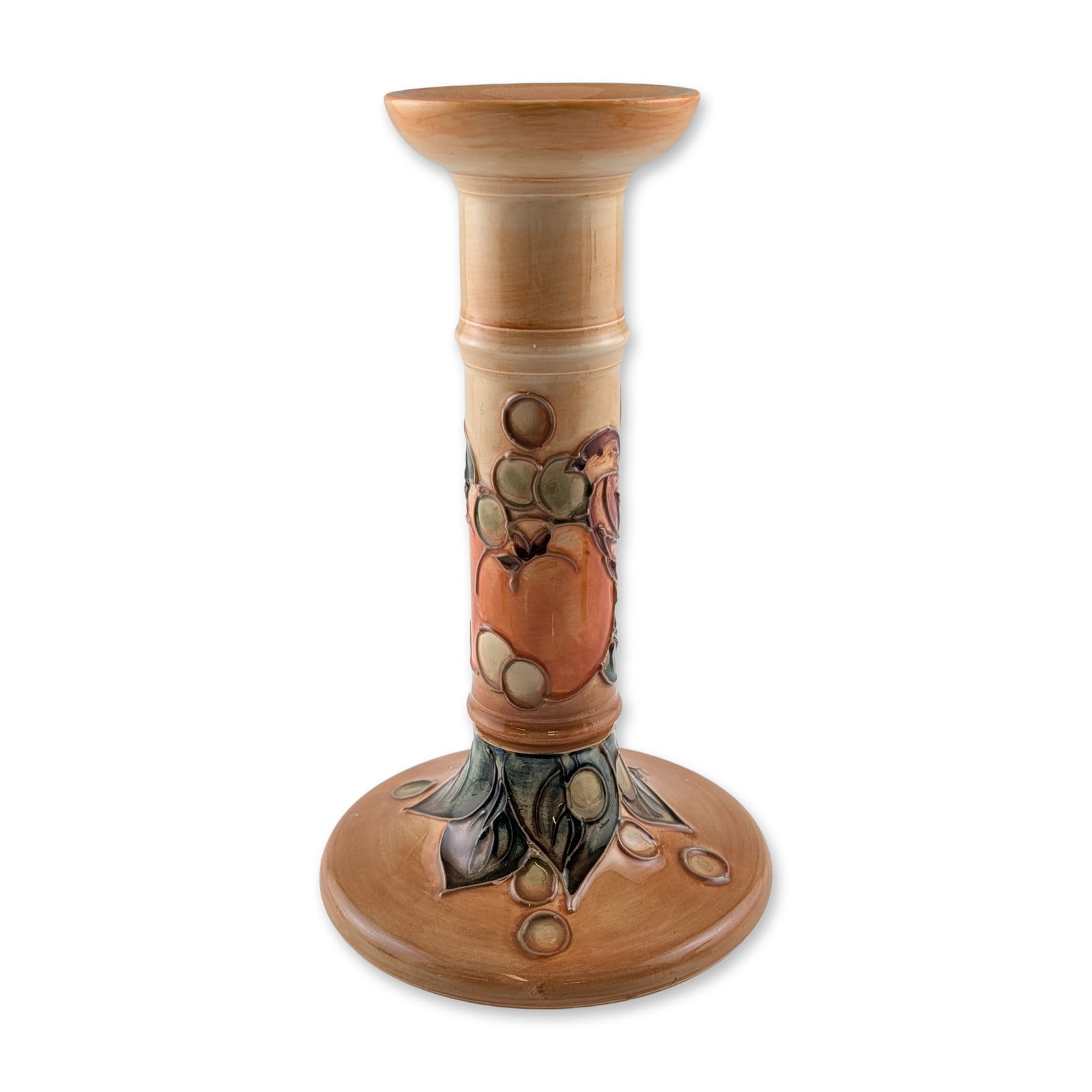Moorcroft English Finches and Fruit Pattern Ceramic Candlestick: English Moorcroft glazed earthenware candlestick in the Finches and Fruit pattern. The piece features a columnar stem and wide circular base decorated with tube-lined motifs of birds and fruit in shad