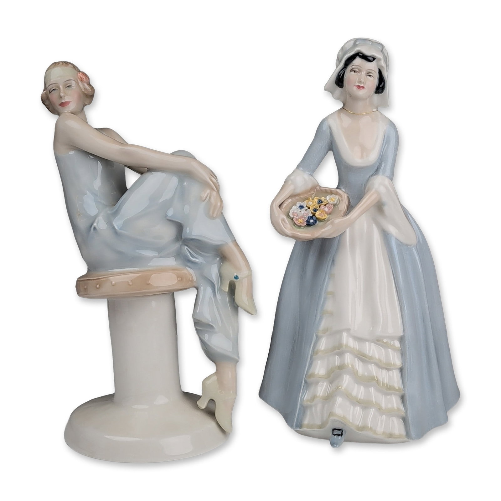 2pc Royal Doulton Reflections Figurines, Flirtation HN3071 and Sweet Violets HN3175: A set of two glazed porcelain figurines from the Royal Doulton Reflections series: Flirtation (HN 3071, 1985), depicting a seated woman adjusting her shoe, modelled by Adrian Hughes; and Sweet Violets