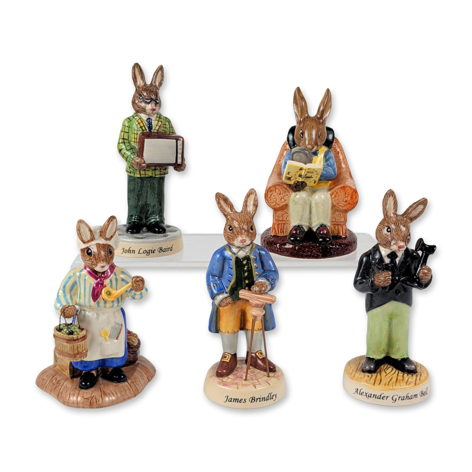 5pc Royal Doulton Bunnykins Inventors and Character Figures Collection: This five-piece collection of hand-painted ceramic figurines from the Royal Doulton Bunnykins line features specialized character groupings primarily from the Inventors Collection. The assortment cons