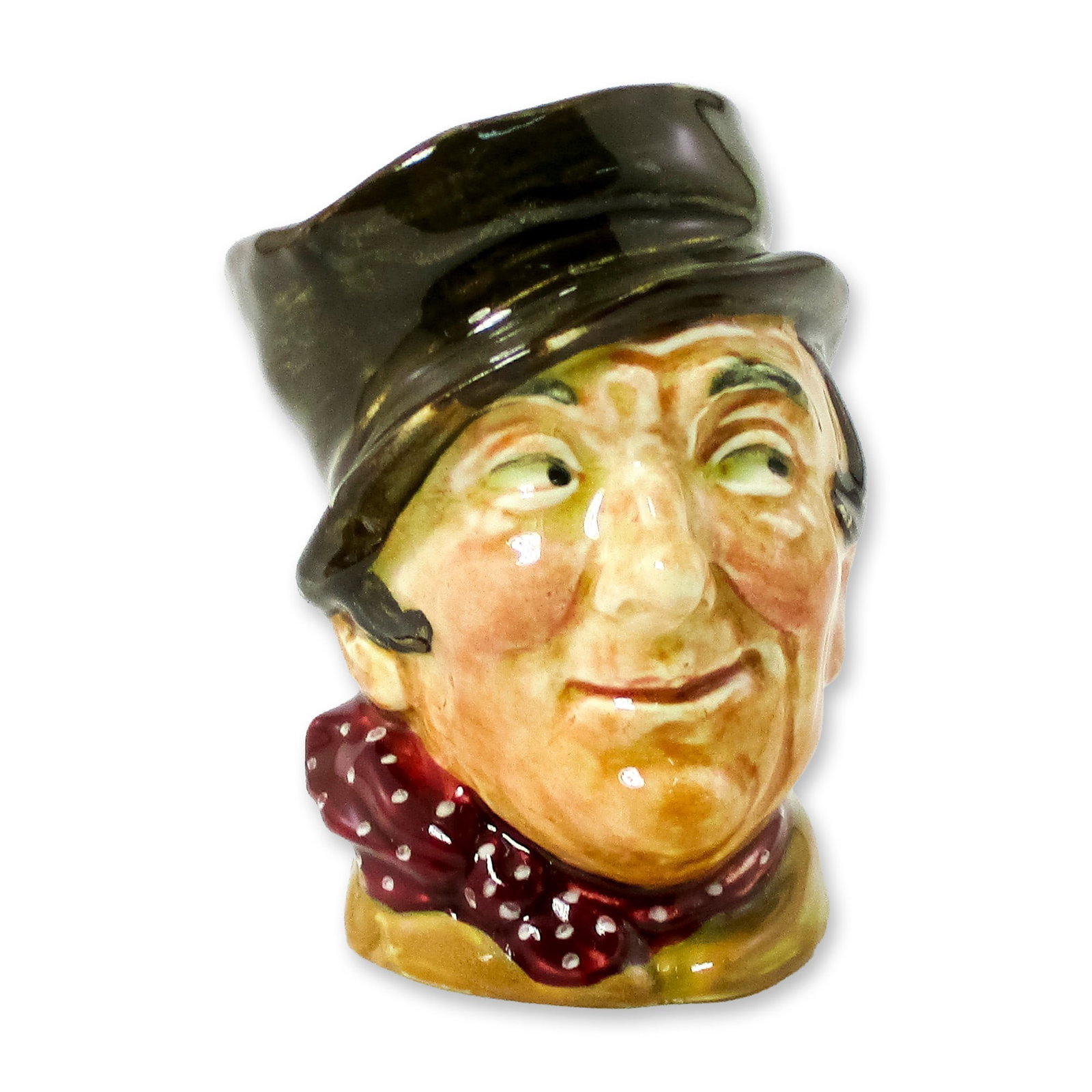 Sam Weller D5841 - Small - Royal Doulton Character Jug: Dark brown hat; light brown coat; red kerchief with white sports. In the 1837 Charles Dickens novel, "The Pickwick Papers," Sam Weller was a boots employed at the White Hart Inn. He became a faithful 