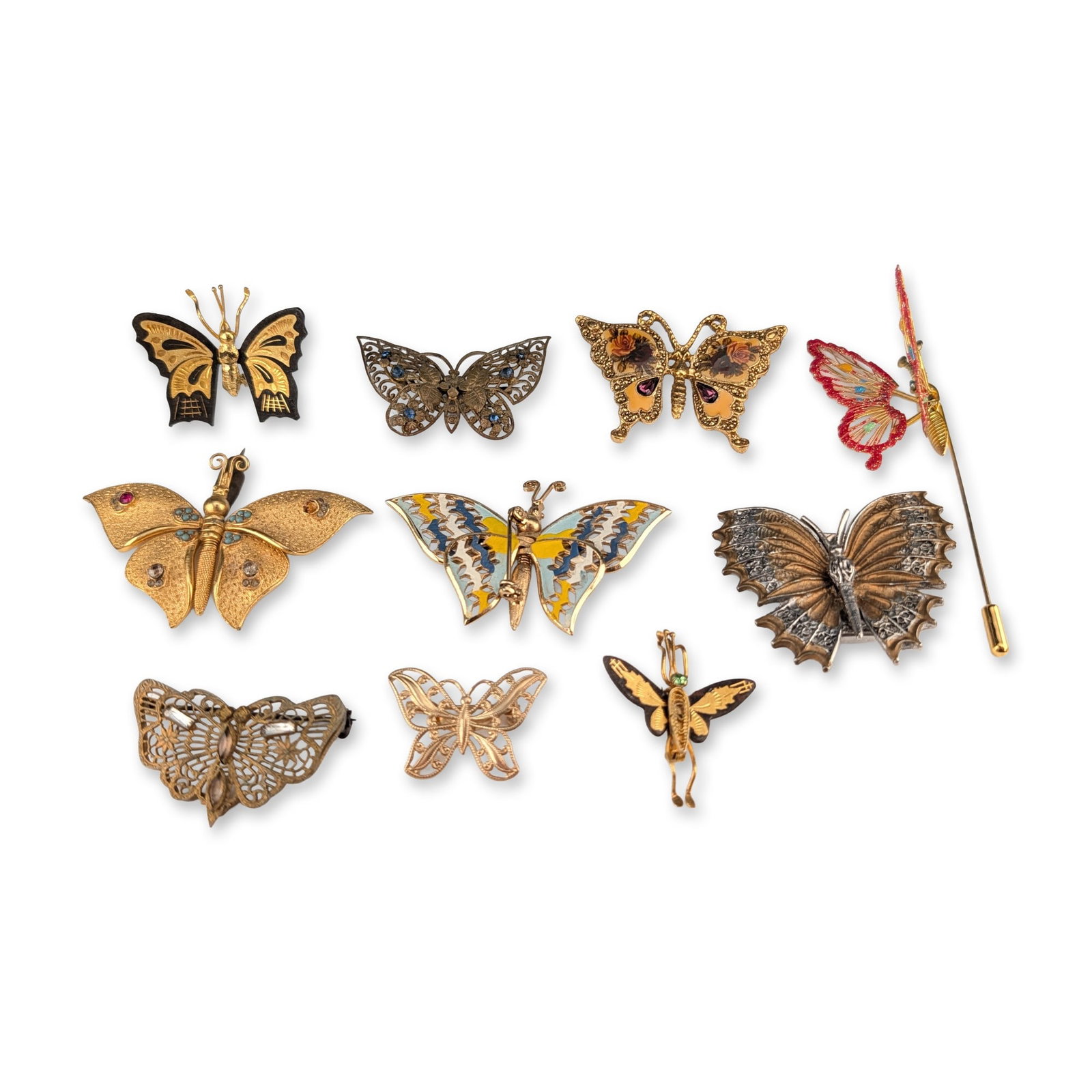 10pc Collection of Vintage Butterfly and Insect Brooches and Pins: A collection of ten vintage butterfly and insect-themed jewelry pieces, comprising nine brooches and one stick pin. The group includes various mid-to-late 20th-century costume jewelry styles such as