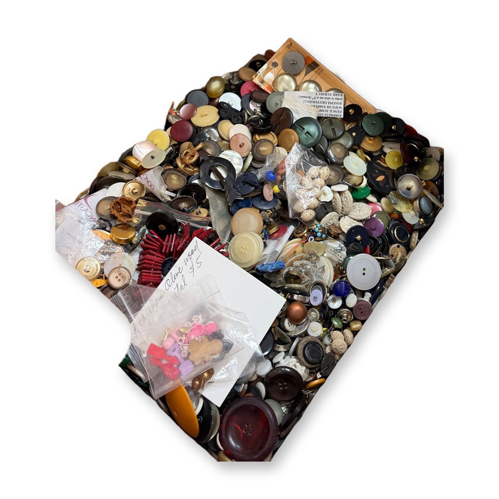 A HUGE BOX LOT OF ASSORTED MATERIAL BUTTONS: 100'S of assorted 19th and 20th century examples. We emptied 20 baggies full of buttons into this box. It includes metals, pearls, and a plethora of materials including many sets. Dimensions: SM=Less