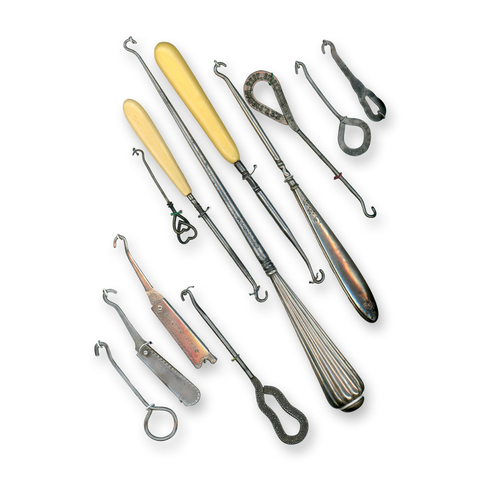 A CARD OF EARLY 20TH CENTURY SHOE HOOKS (1 of 4)