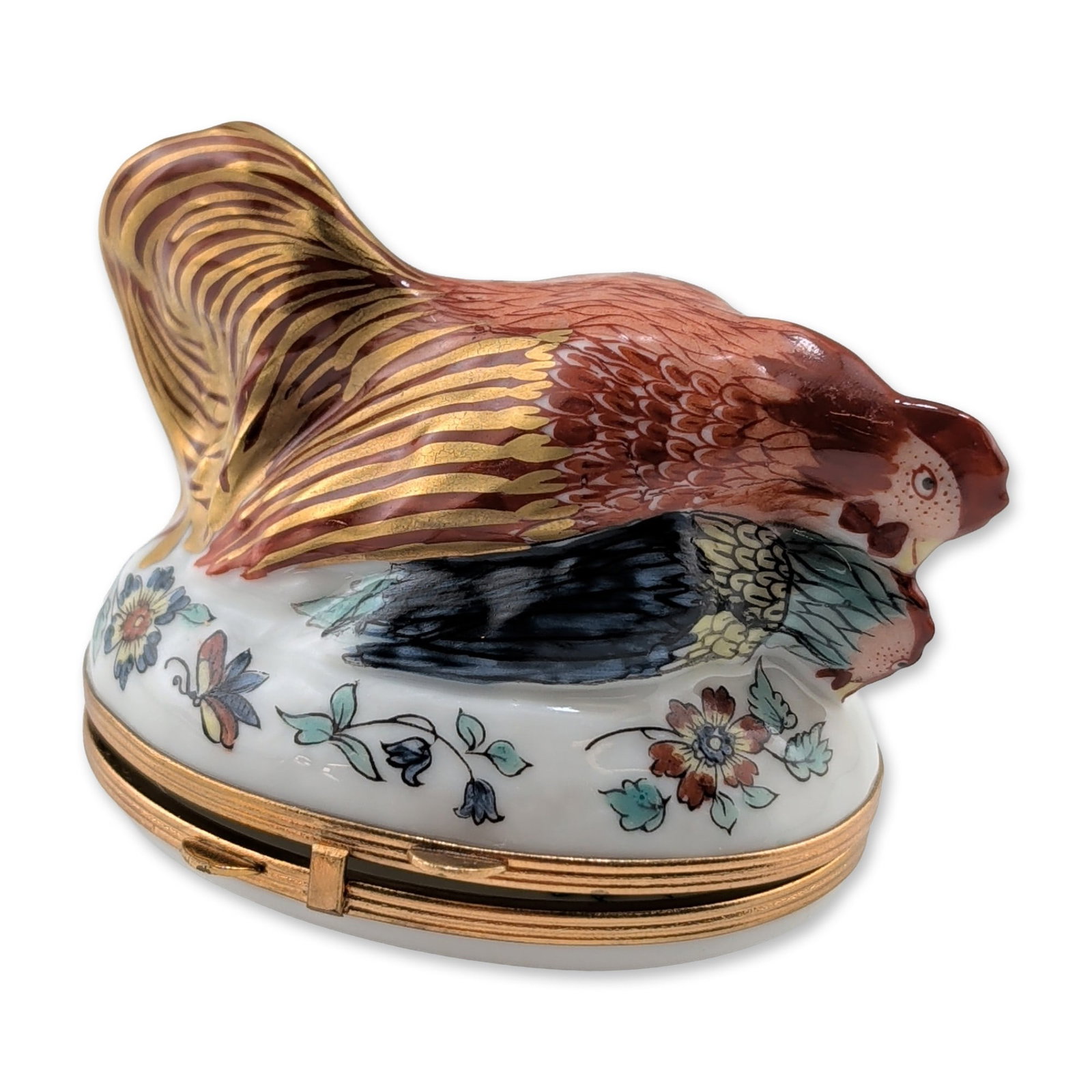 French Porcelain Hinged Mating Rooster and Hen Box: This French porcelain hinged box features a dimensional, sculptural lid depicting a mating rooster and hen, vividly decorated with hand-painted enamels in iron red, cobalt blue, yellow, and fine gilde