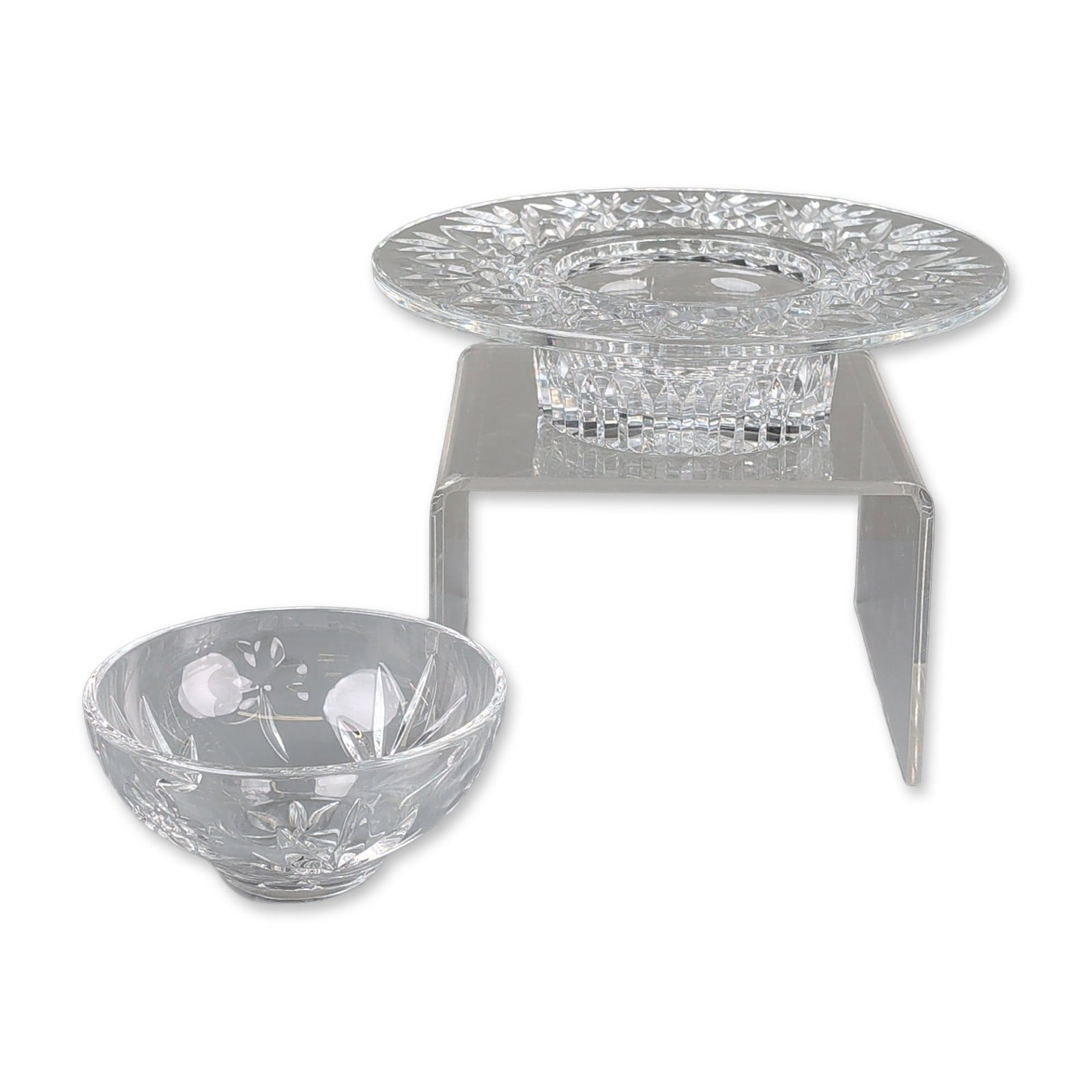 2pc Waterford Crystal Compote Bowl and Candy Dish, Signed Sam O'Donnell: Lead crystal suite comprising a flared tazza comport and a footed bowl featuring hand-cut decoration. Both pieces are ornamented with stylized foliate sprays, multi-pointed starbursts, and geometric f