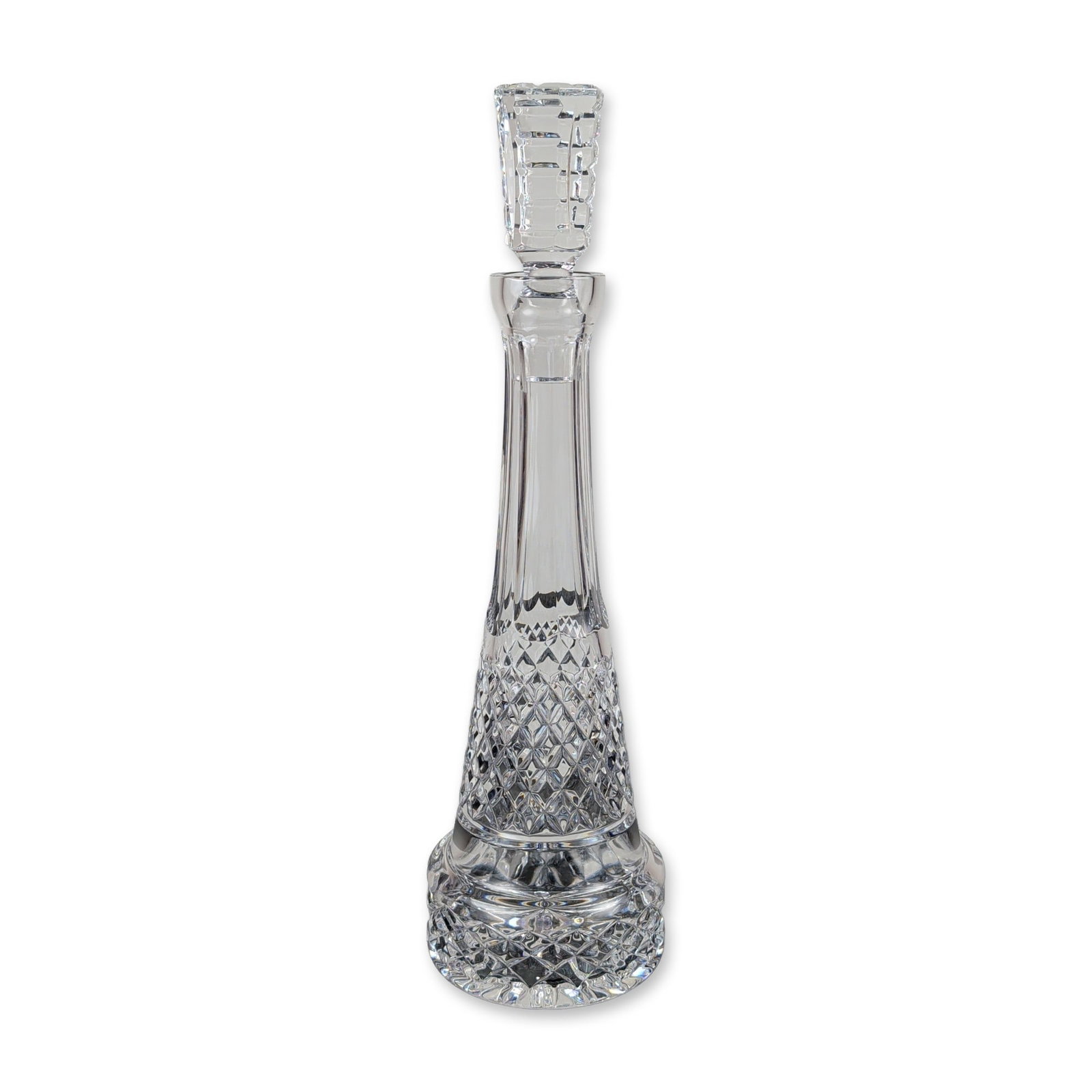 Waterford Crystal Cut Glass Decanter: Lead crystal wine decanter with a fitted stopper. The lower portion of the body features a dense field of deep diamond-cut patterns positioned below a band of circular diamond facets. Vertical flute c