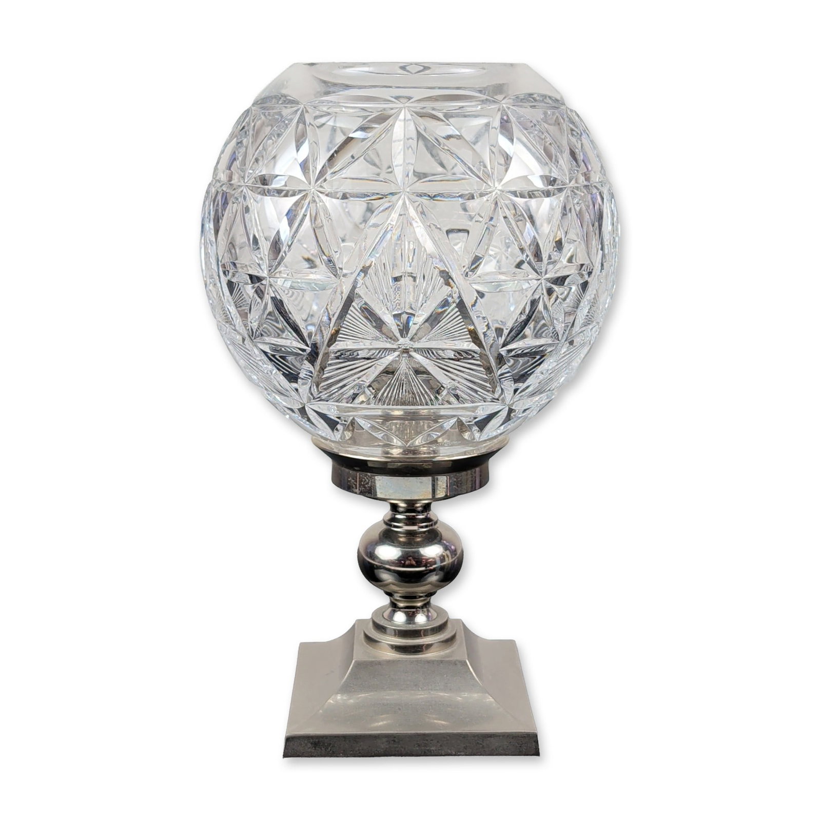 Waterford Jim O'Leary Signed 2000 Crystal Times Square Candle Lamp: Waterford Crystal two-piece candle lamp featuring a deeply cut lead crystal globe shade and a polished white metal pedestal base. The spherical shade is decorated with a complex geometric pattern of i