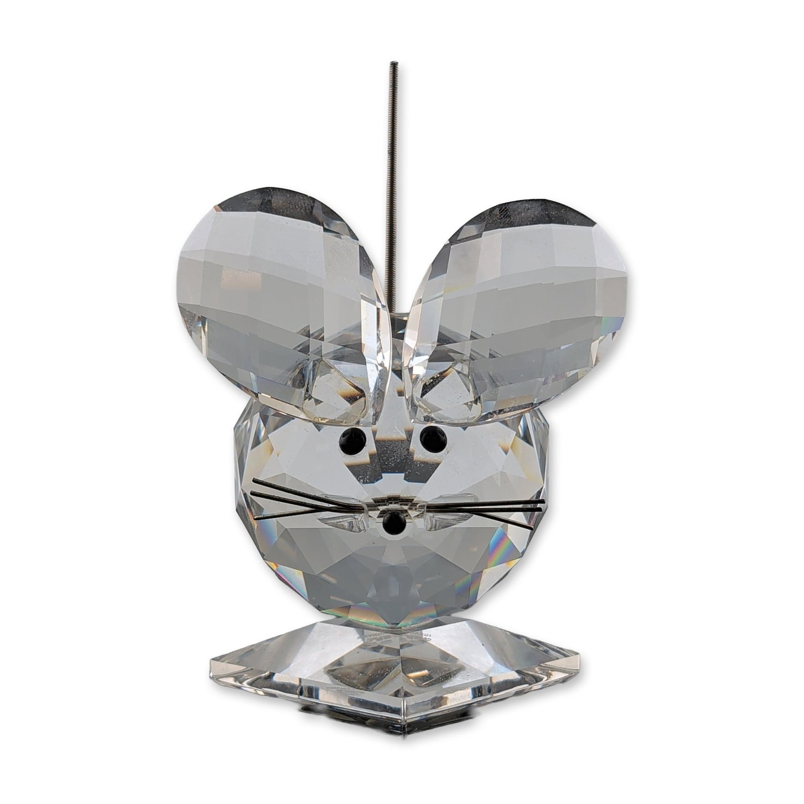Swarovski Silver Crystal Mouse King Figurine: Swarovski Mouse figurine in faceted lead crystal, featuring a spherical faceted body, two oval faceted ears, a metal tail, and a square crystal base. Detailed with three black bead accents for the