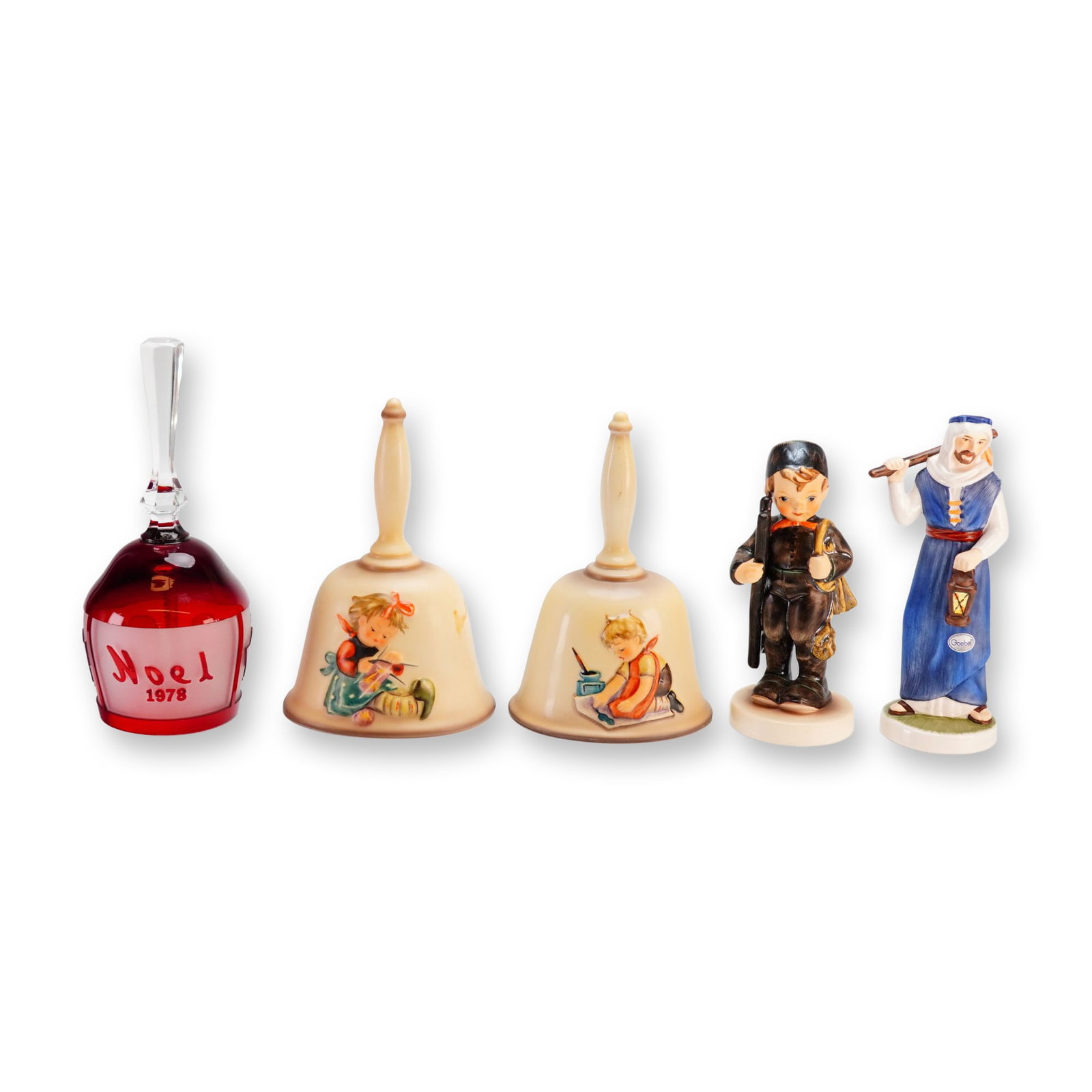 Goebel and M.I. Hummel 5-Piece Grouping Including Three Bells and Two Figurines: This vintage 5-piece Goebel grouping includes three bells and two figurines. The collection features a 1978 Goebel Limited Edition Crystal Bell Noel in red cased glass with a clear faceted handle and 
