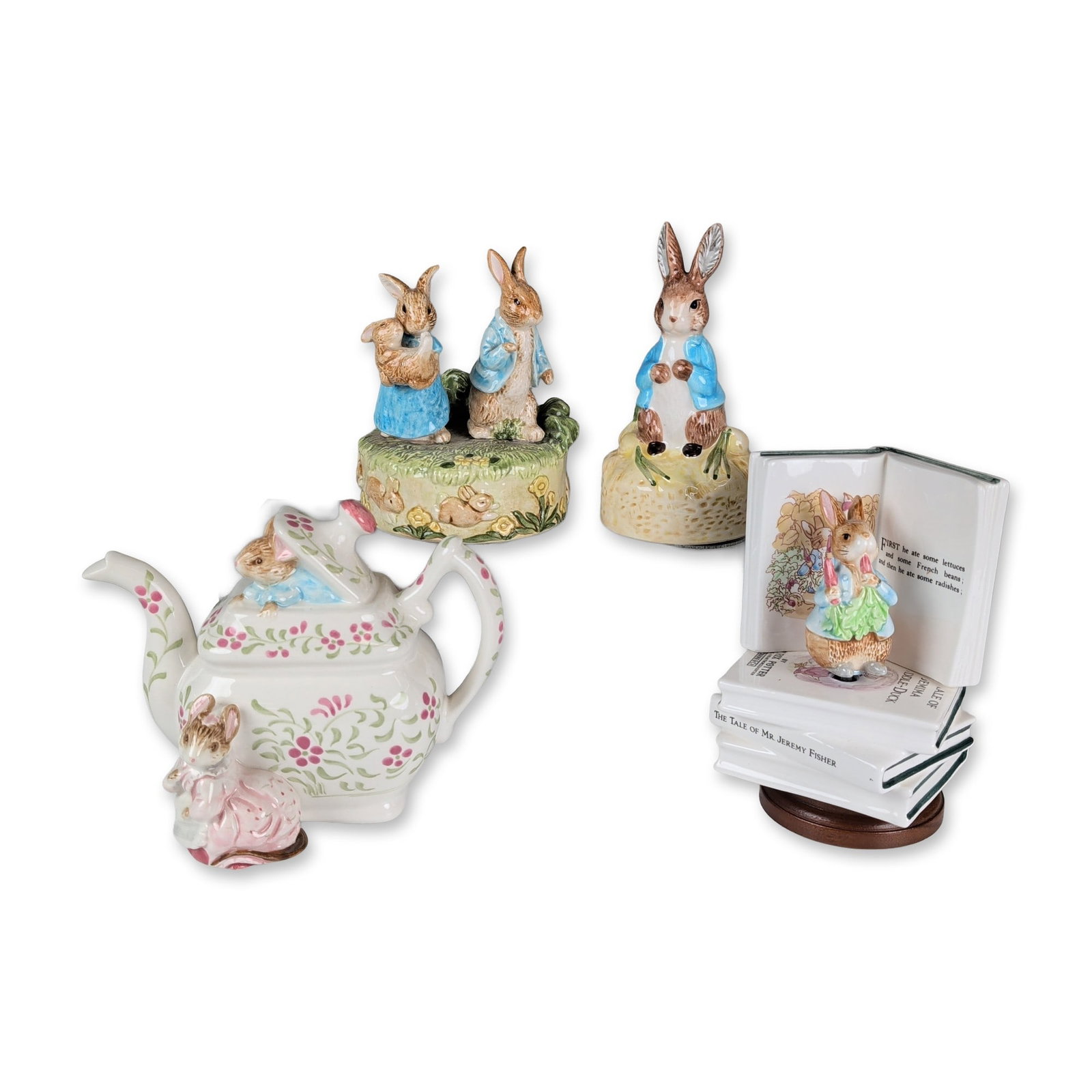 4pc Schmid Beatrix Potter Musical Ceramic Figurines: A collection of four Schmid hand-painted ceramic musical figurines featuring characters from Beatrix Potter stories. Each piece is constructed with a glossy glaze and integrated mechanical music box c