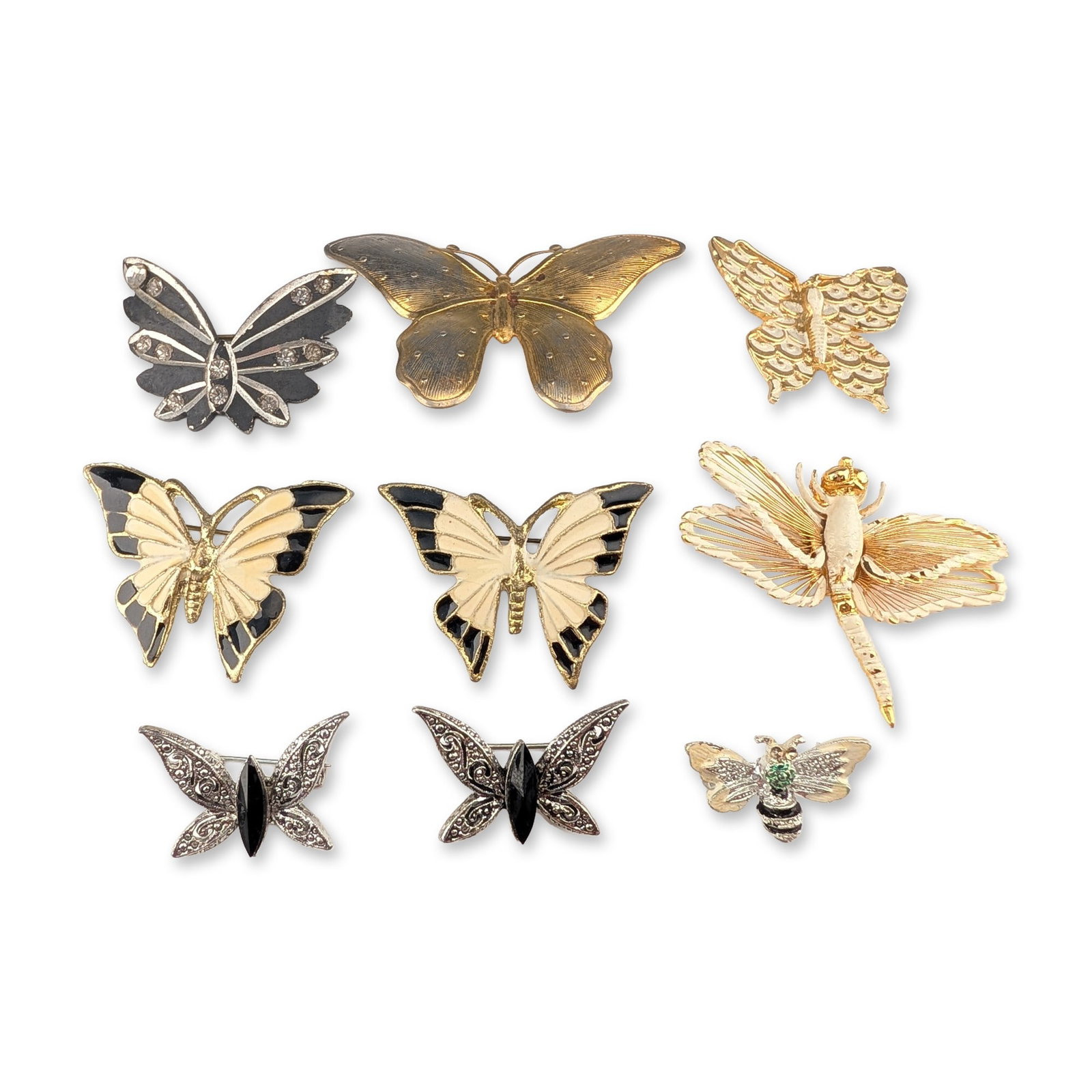 9pc Collection of Vintage Insect Costume Jewelry Brooches: A collection of nine vintage costume jewelry brooches featuring insect motifs, including butterflies, a dragonfly, and a bee. The assortment includes two butterflies with cream and black enamel wings,