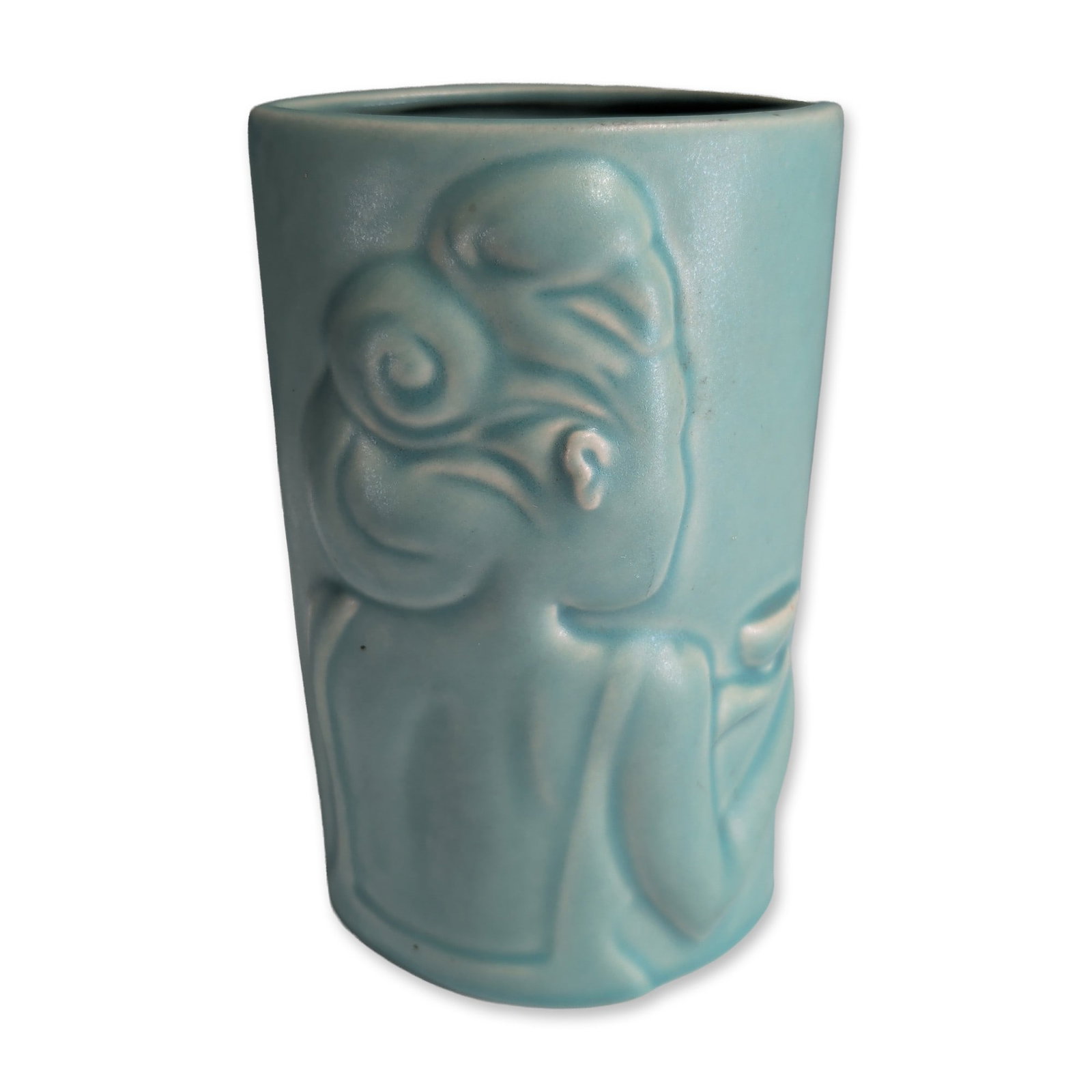 Donna Polseno Turquoise Relief Vase, Woman Serving Tea, Signed: Studio pottery vessel in glazed earthenware, featuring a tapered oval form with high-relief molded decoration. The obverse depicts a stylized, expressive head of a young woman whose hand is depicted i