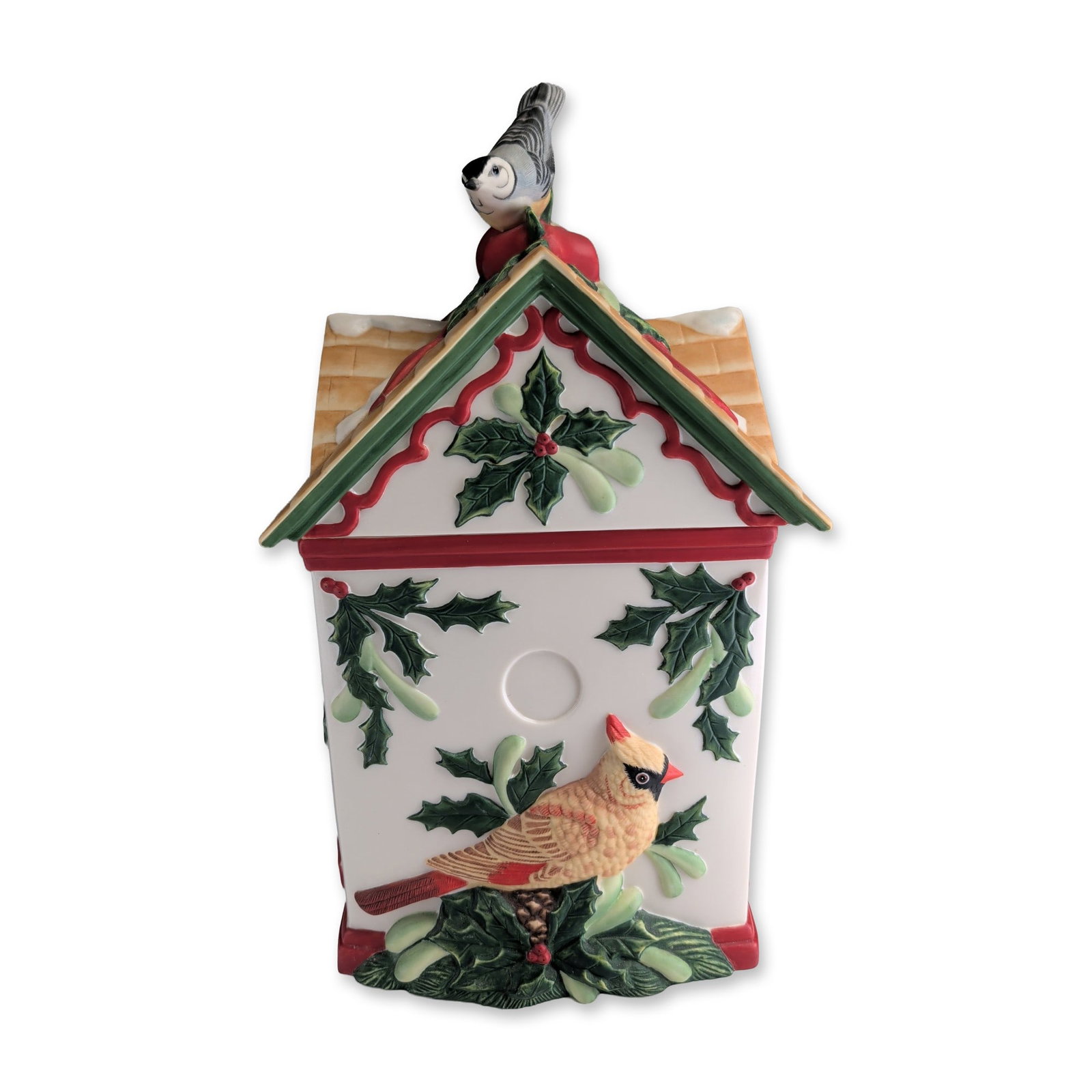 Lenox Winter Greetings Birdhouse Cookie Jar w/ Lid: Chinese glazed ceramic cookie jar modeled in the form of a gabled birdhouse, part of the Winter Greetings Everyday collection by Lenox. The vessel features relief-molded decoration including a male No