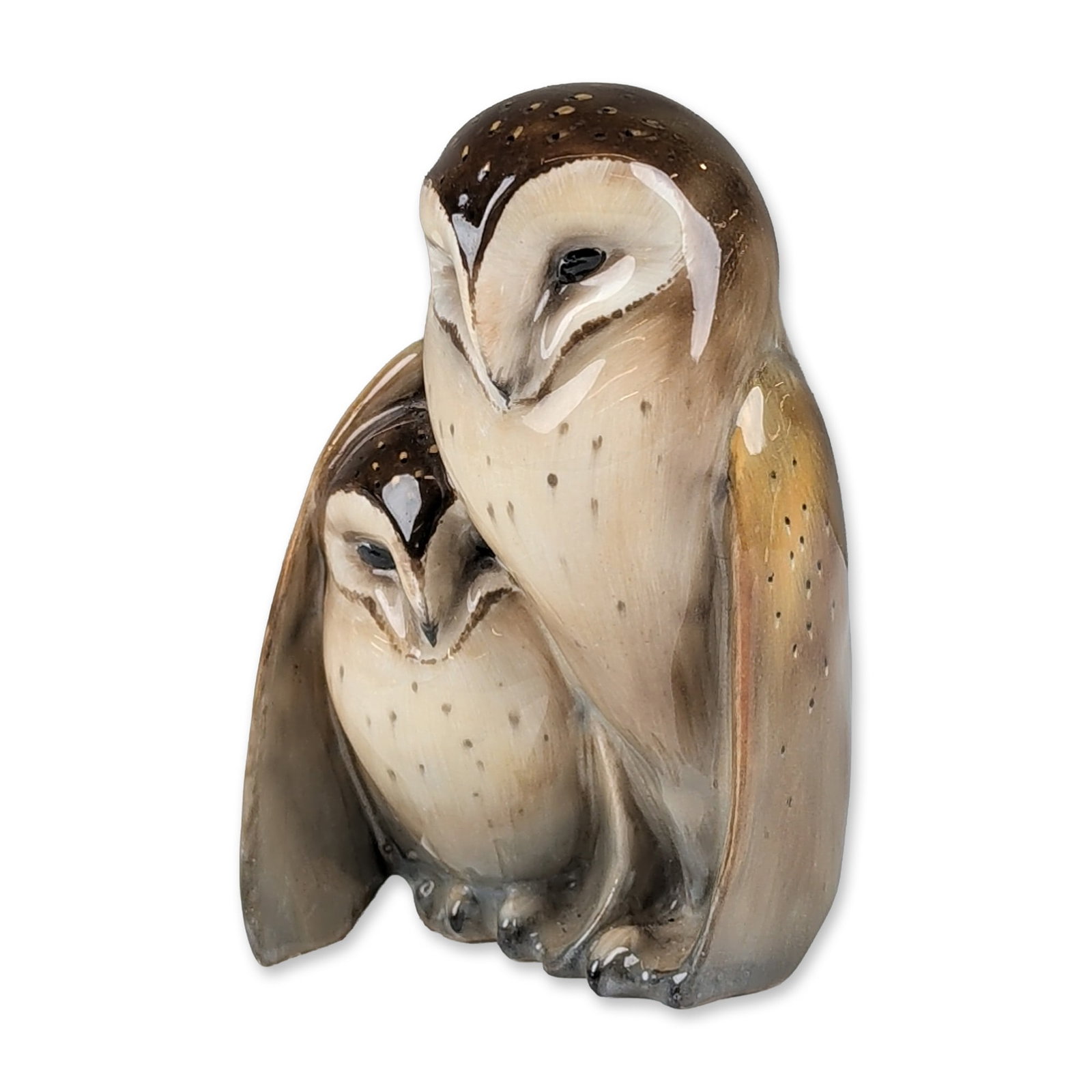 Royal Doulton Porcelain Figurine, Owl with Owlet Under Wing HN160: Figurine of two barn owls in polychrome glazed porcelain. The grouping depicts an adult bird sheltering a juvenile chick, finished in a high-gloss glaze with mottled brown, tan, and cream tones and da