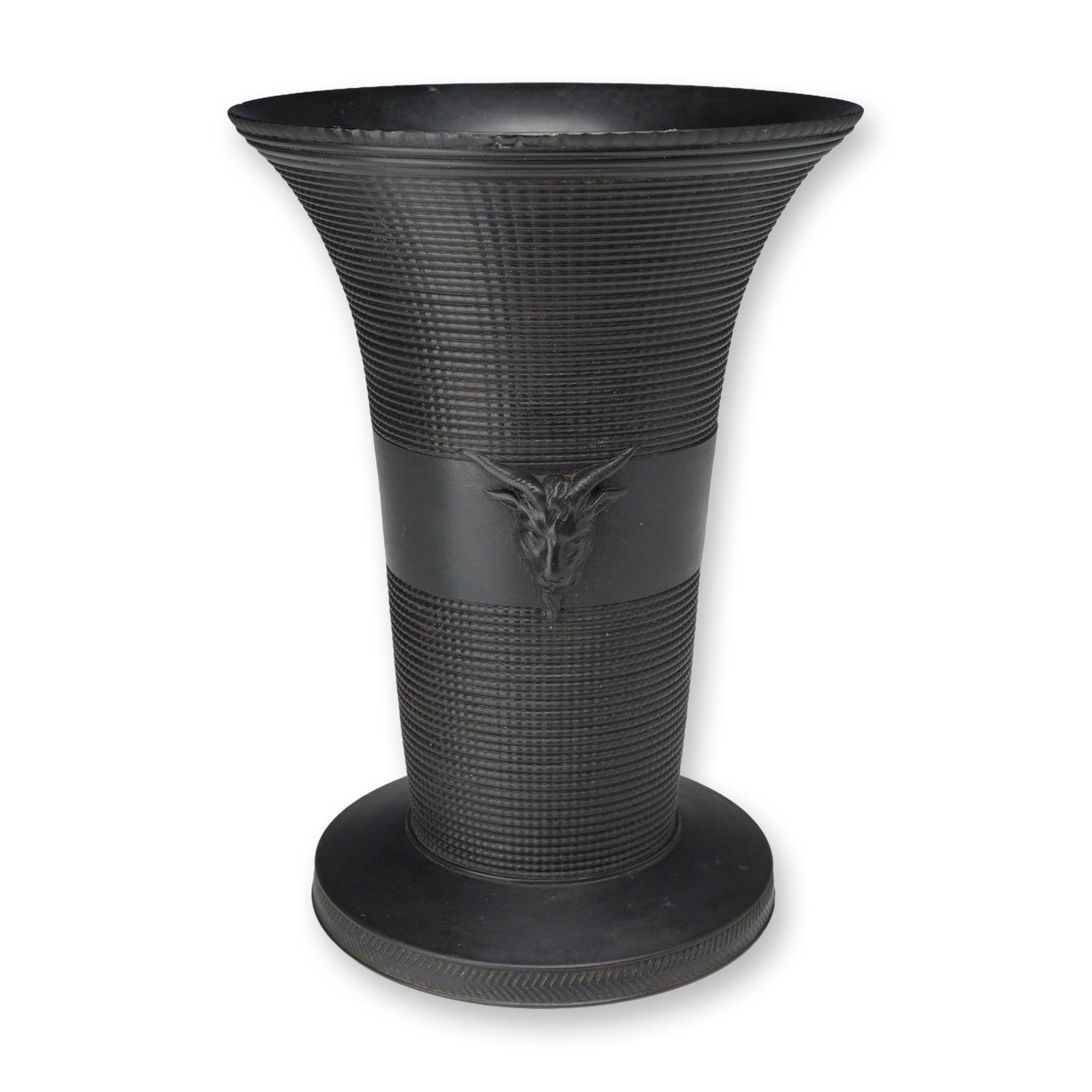 Wedgwood Black Basalt Engine-Turned Goat Mask Vase, circa 1880: A late 19th-century Wedgwood black basalt stoneware vase of flared beaker form. The vessel features sophisticated engine-turned decoration consisting of fine horizontal ribbing and vertical dicing on 