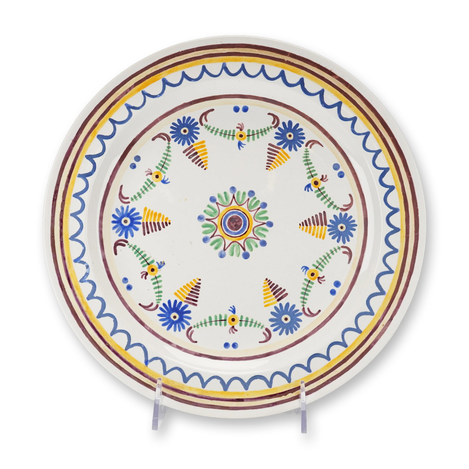 Wedgwood Hand-Painted Arts and Crafts Earthenware Charger, Circa 1922: This large circular earthenware charger features a hand-painted Arts and Crafts design in underglaze colors, characteristic of the work of Alfred and Louise Powell for Wedgwood. The central medallion 