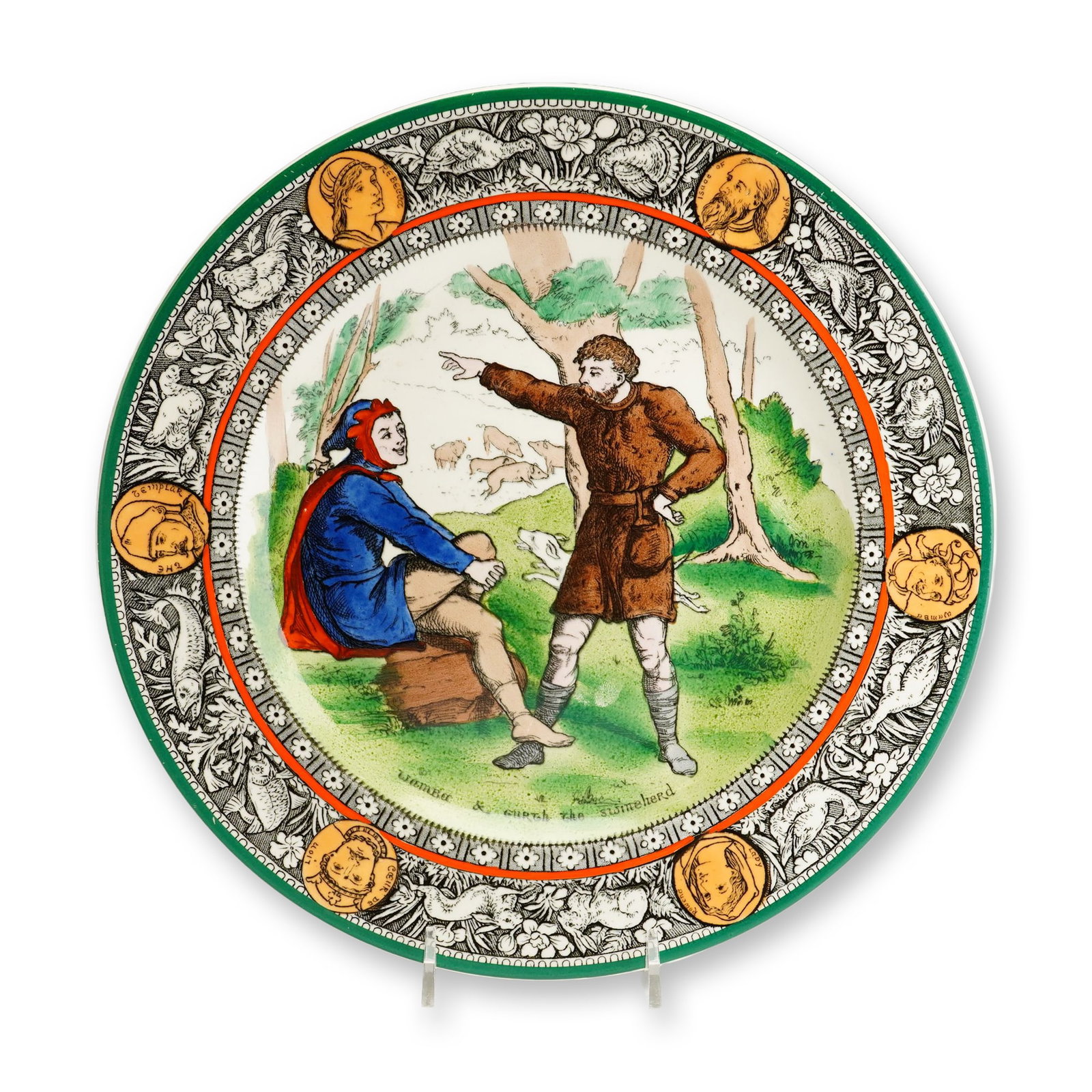 Wedgwood Etruria Ivanhoe Seriesware Plate, Wamba & Gurth the Swineherd: Based on Walter Scott's 1819 English novel, Ivanhoe, this earthenware plate features a detailed forest scene with Gurth the swineherd conversing with Wamba the jester. The decorative border showcases 