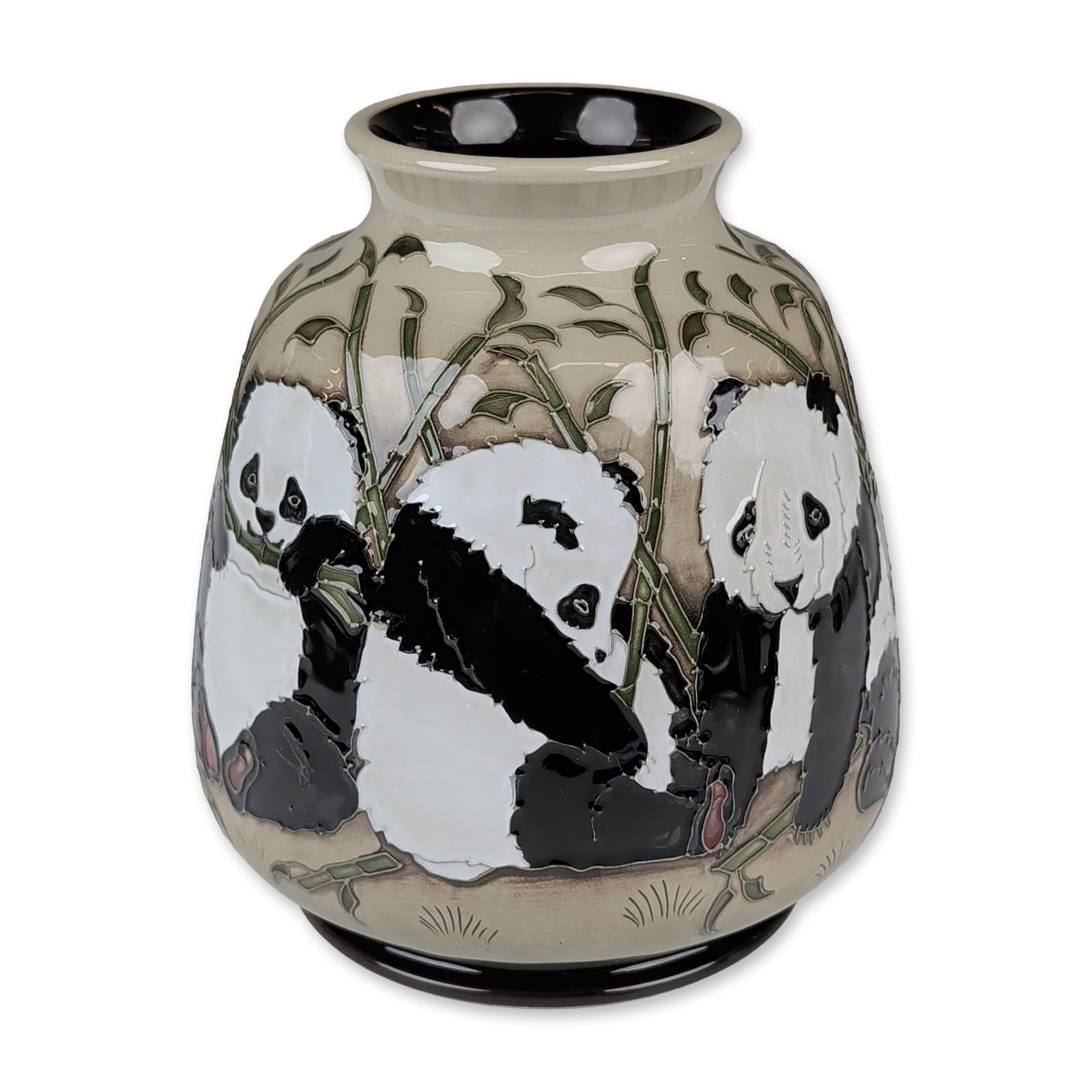 Moorcroft Pottery by Marie Penkethman Panda Vase, The Family: Featuring tube-lined and hand-painted giant pandas among bamboo stalks. The exterior is finished with a shaded greenish-beige ground, while the interior and base are coated in a dark chocolate-brown h