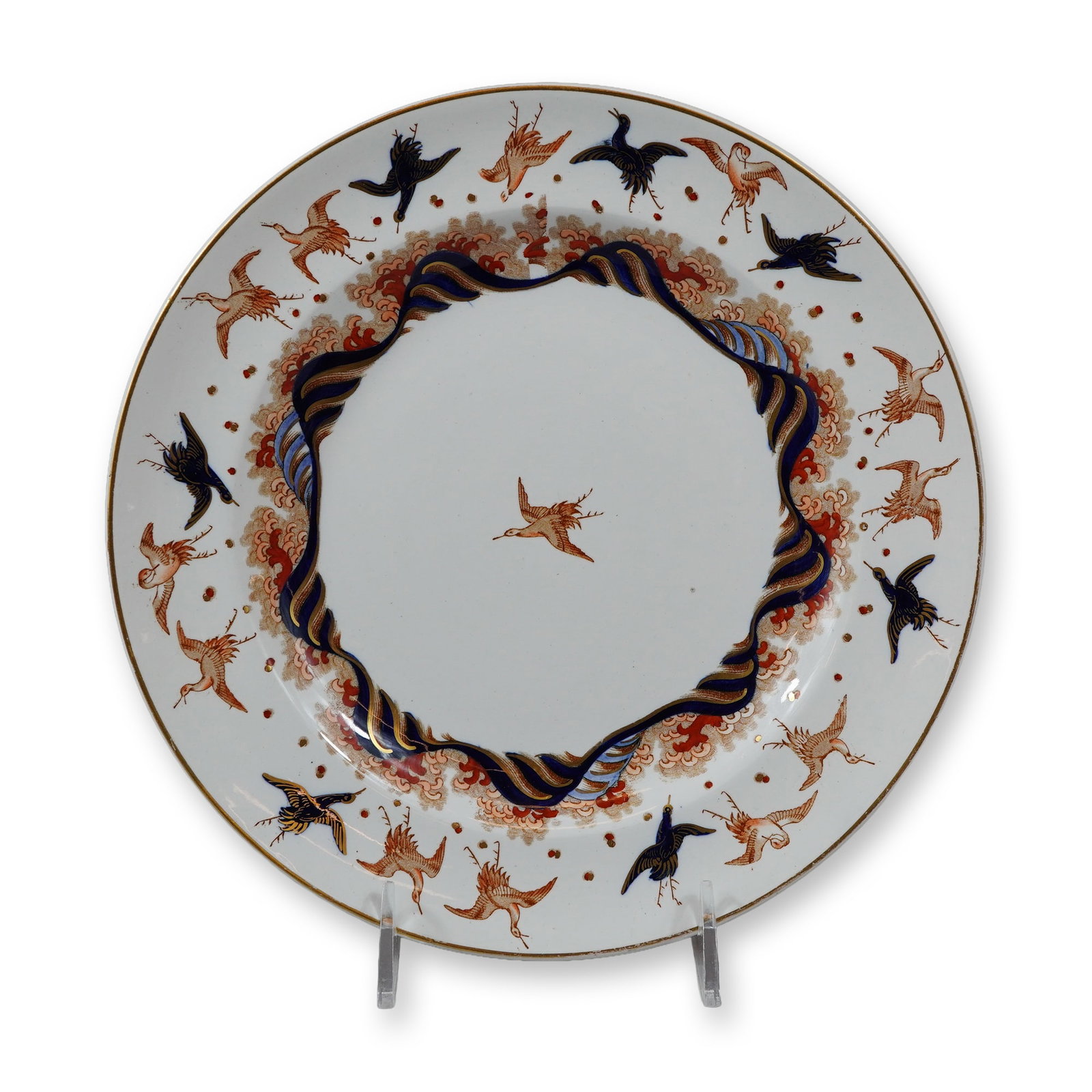 Minton Japanese Crane Pattern Aesthetic Movement Ceramic Plate: This ceramic plate was manufactured by Minton in the Japanese Crane pattern, reflecting the influence of the Aesthetic Movement. The decoration features a central well with a single flying crane in