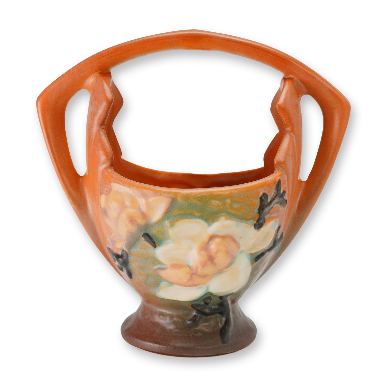 Roseville Pottery Magnolia Pattern Handled Basket Vase 383-7: A vintage American art pottery basket-style vase produced by the Roseville Pottery Company of Zanesville, Ohio. This piece is from the Magnolia pattern, the vessel features a molded ceramic body with 