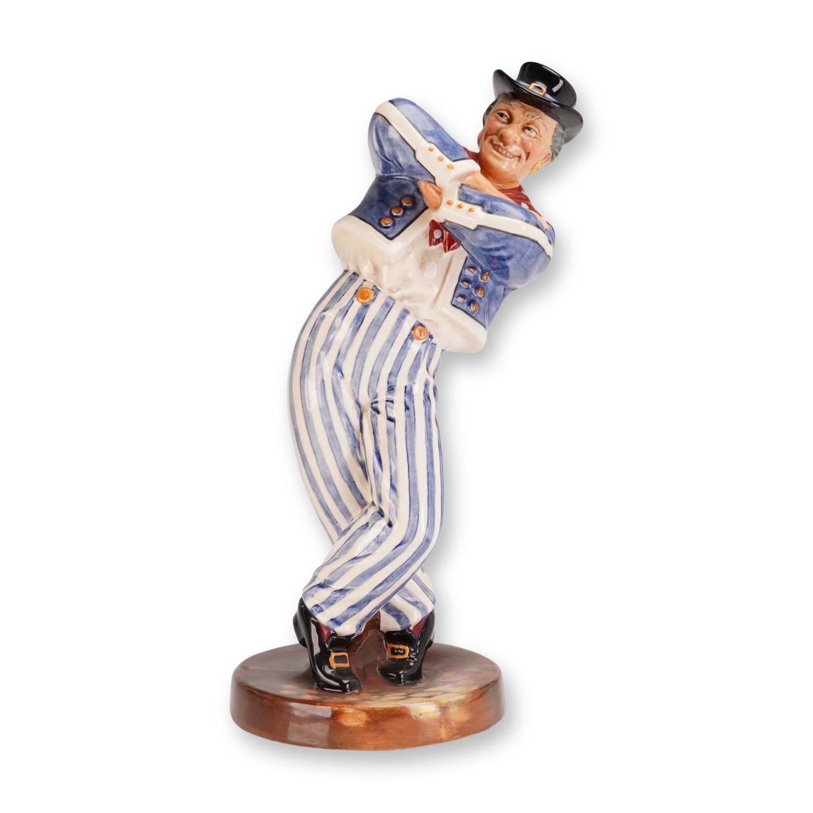 Royal Doulton Porcelain Figurine, Hornpipe HN2161: Royal Doulton porcelain figurine titled The Hornpipe, model HN 2161. Designed by Mary Nicoll. The figure depicts a sailor in a dynamic dance pose, dressed in maritime-style attire featuring blue and w