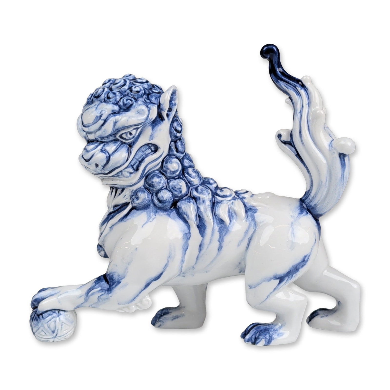 Royal Doulton Prototype Flambe Blue and White Foo Dog Figurine: Royal Doulton porcelain figurine of a Chinese Guardian Lion or Foo Dog. The figure is modeled in a dynamic descending pose with its hindquarters elevated and a front paw resting on a traditional broca