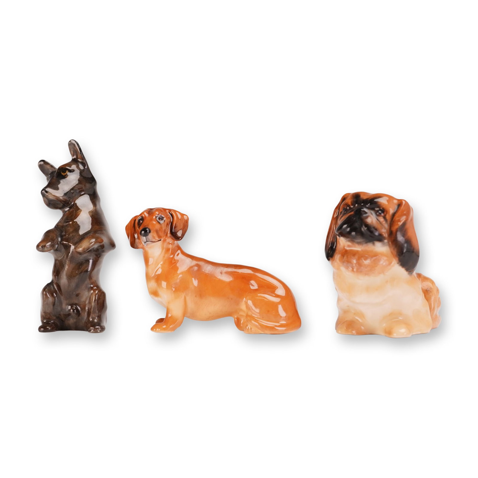 3pc Royal Doulton Dog Figurines, Pekinese, Dachshund, and Scottish Terrier (1 of 3)