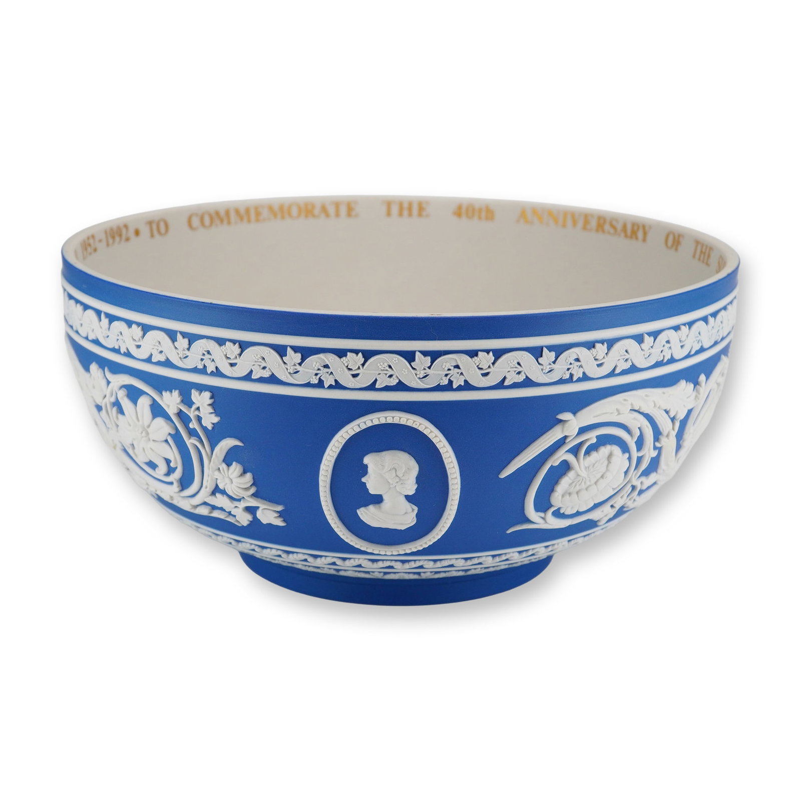 Wedgwood Limited Edition Cobalt Blue Jasperware Queen Elizabeth II 40th Anniversary Bowl: A large footed Wedgwood jasperware bowl crafted in cobalt blue stoneware with applied white bas-relief sprigged decoration. This limited-edition piece was manufactured in 1992 to commemorate the 40th 