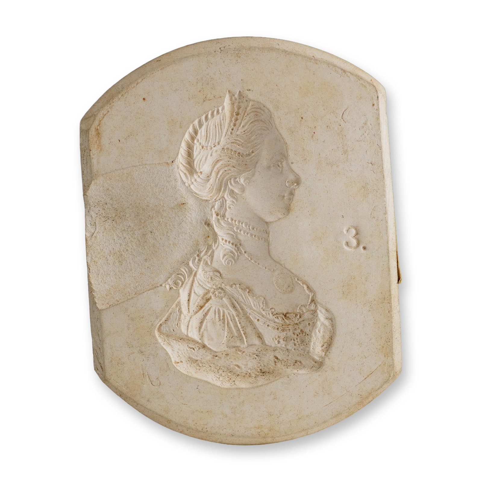 Wedgwood White Jasperware Intaglio Sprig Mold Depicting Queen Charlotte: A Wedgwood white jasperware or bisque ceramic intaglio sprig mold used for creating relief applications. The mold features a profile bust of Queen Charlotte facing right, depicted with an elaborate la