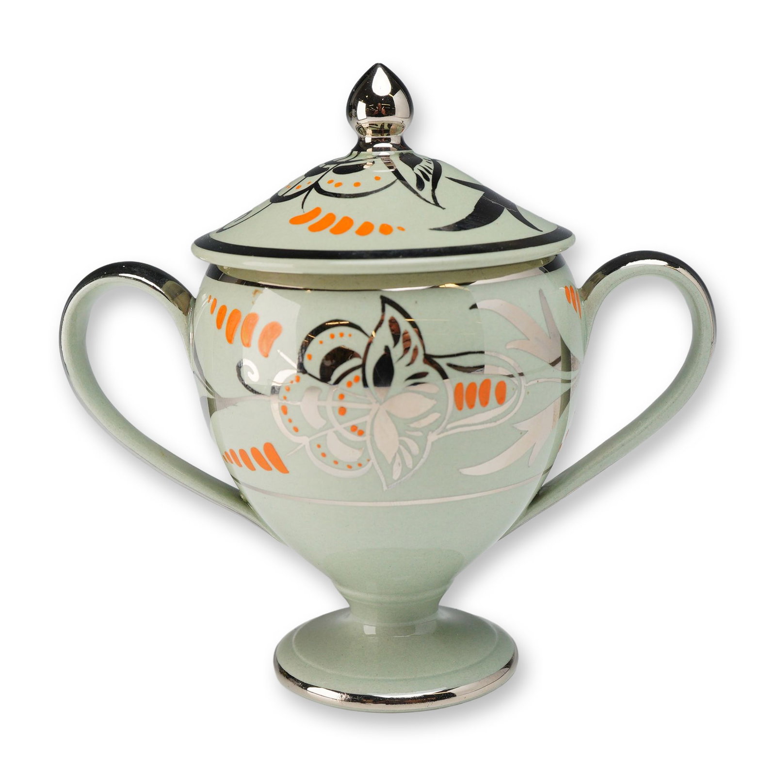Wedgwood Art Deco Silver Resist Lidded Sugar Bowl, c. 1930: This Art Deco lidded sugar bowl was produced by Wedgwood circa 1930. The piece is constructed of glazed earthenware with a pale mint-green ground. It is decorated using the silver resist technique, fe