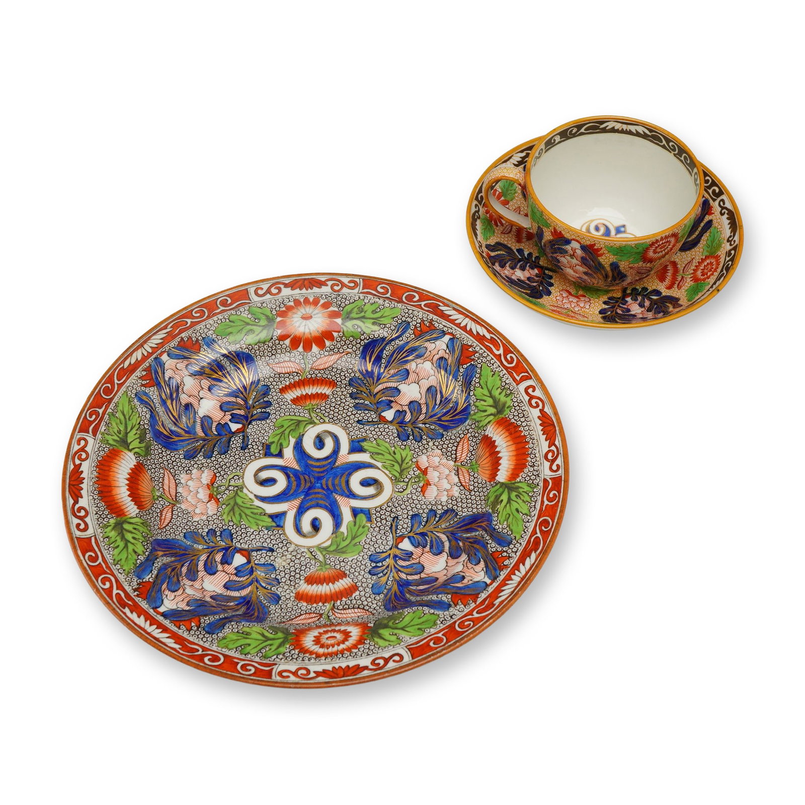 3pc Wedgwood Porcelain Tea Setting: A Wedgwood porcelain tea trio consisting of a teacup, saucer, and side plate in the A4423 pattern. The decoration features an Imari-style palette with underglaze blue, overglaze iron-red, and green en