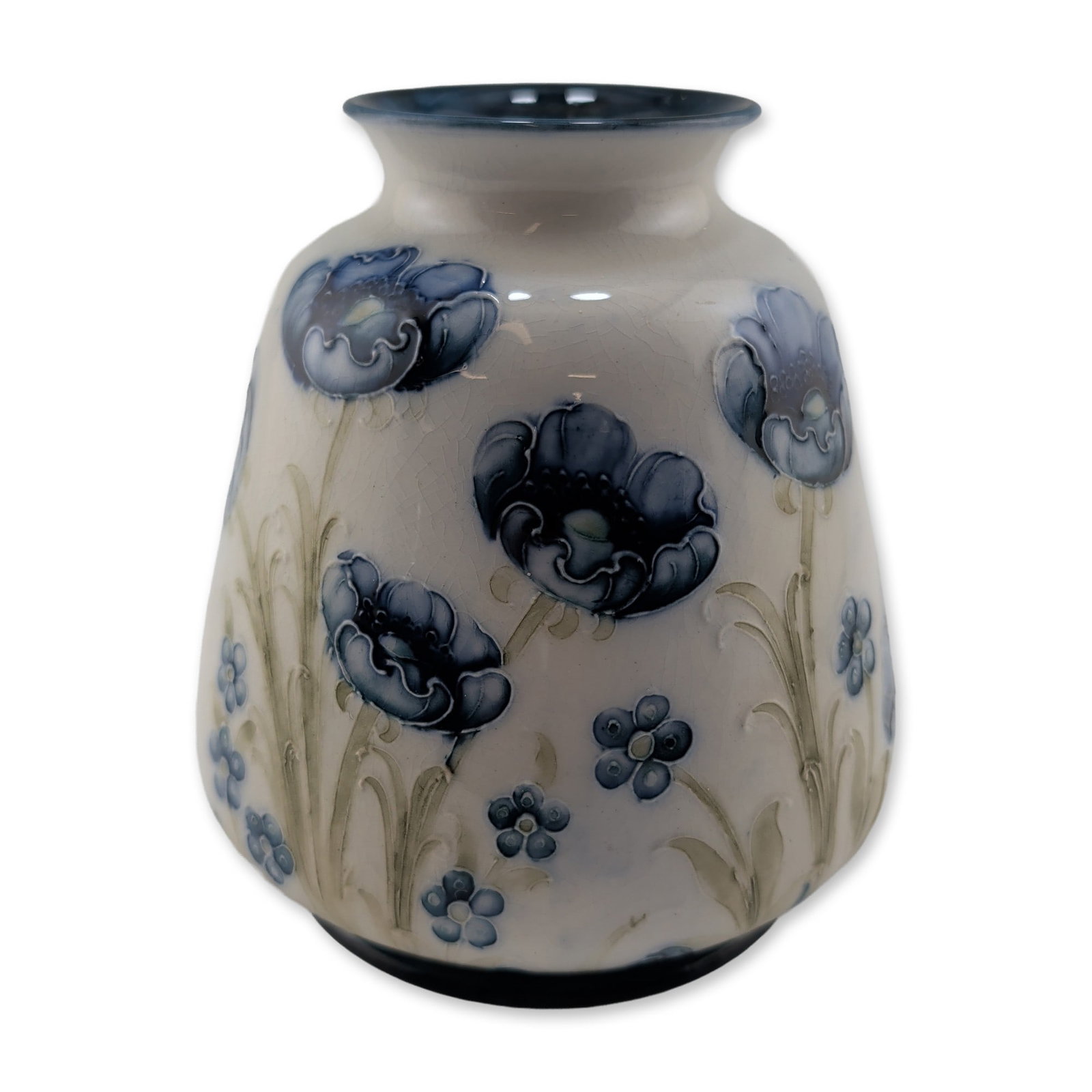 Moorcroft Macintyre Blue Poppy Florian Ware Vase: The bulbous form features a flared rim and is decorated with hand-painted underglaze and tube-lined floral motifs in shades of cobalt blue and celadon green against a cream ground. The underside of th
