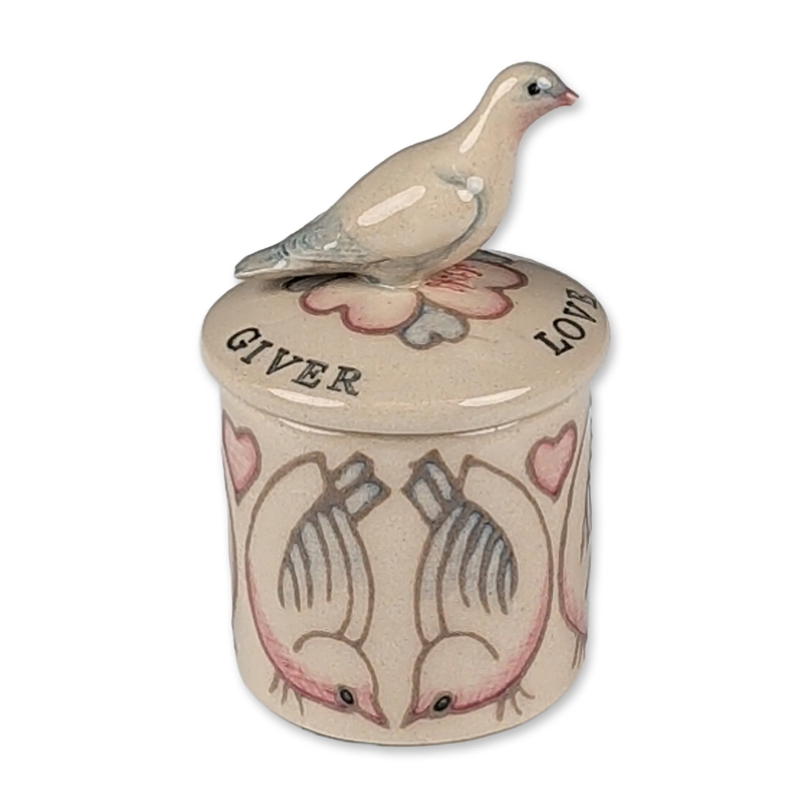 Dennis Chinaworks by Sally Tuffin Miniature Ceramic Bird Trinket Box: A miniature cylindrical lidded trinket box in glazed ceramic, featuring hand-painted sgraffito-style decoration of stylized birds and hearts in pink, blue, and brown tones. The lid is surmounted by a 