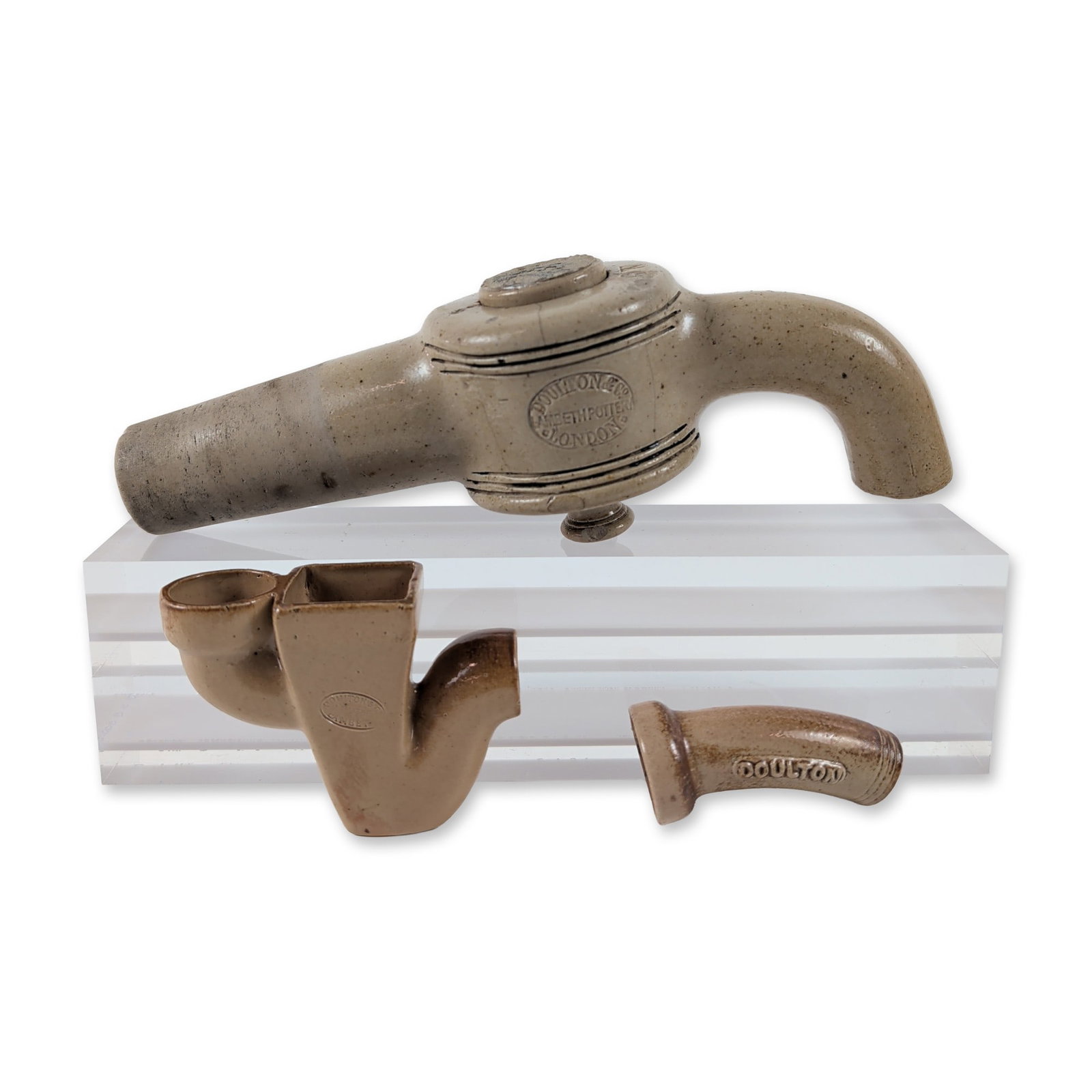 3pc Doulton Lambeth Stoneware Salesman Sample Plumbing Components: Doulton Lambeth, London. Trio of Victorian industrial sanitary plumbing components in salt-glazed stoneware. The group includes a large valve assembly featuring a central cylindrical drum with curved 
