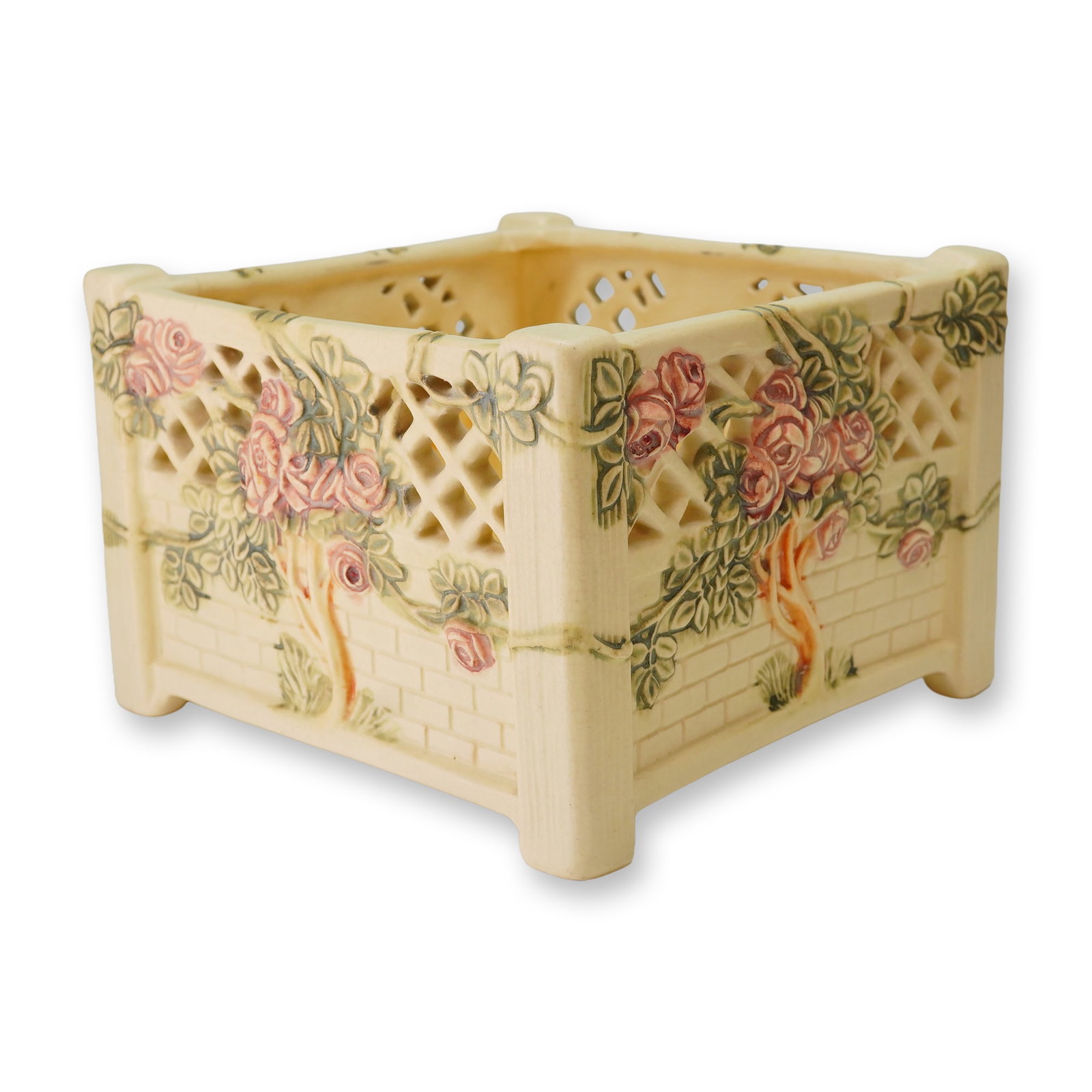 Weller Pottery Roma Rose Pattern Square Reticulated Ceramic Planter: Produced by Weller Pottery of Zanesville, Ohio, this square jardiniere or planter is executed in the Roma pattern, a staple of the company's production during the 1910s and 1920s. The vessel is crafte