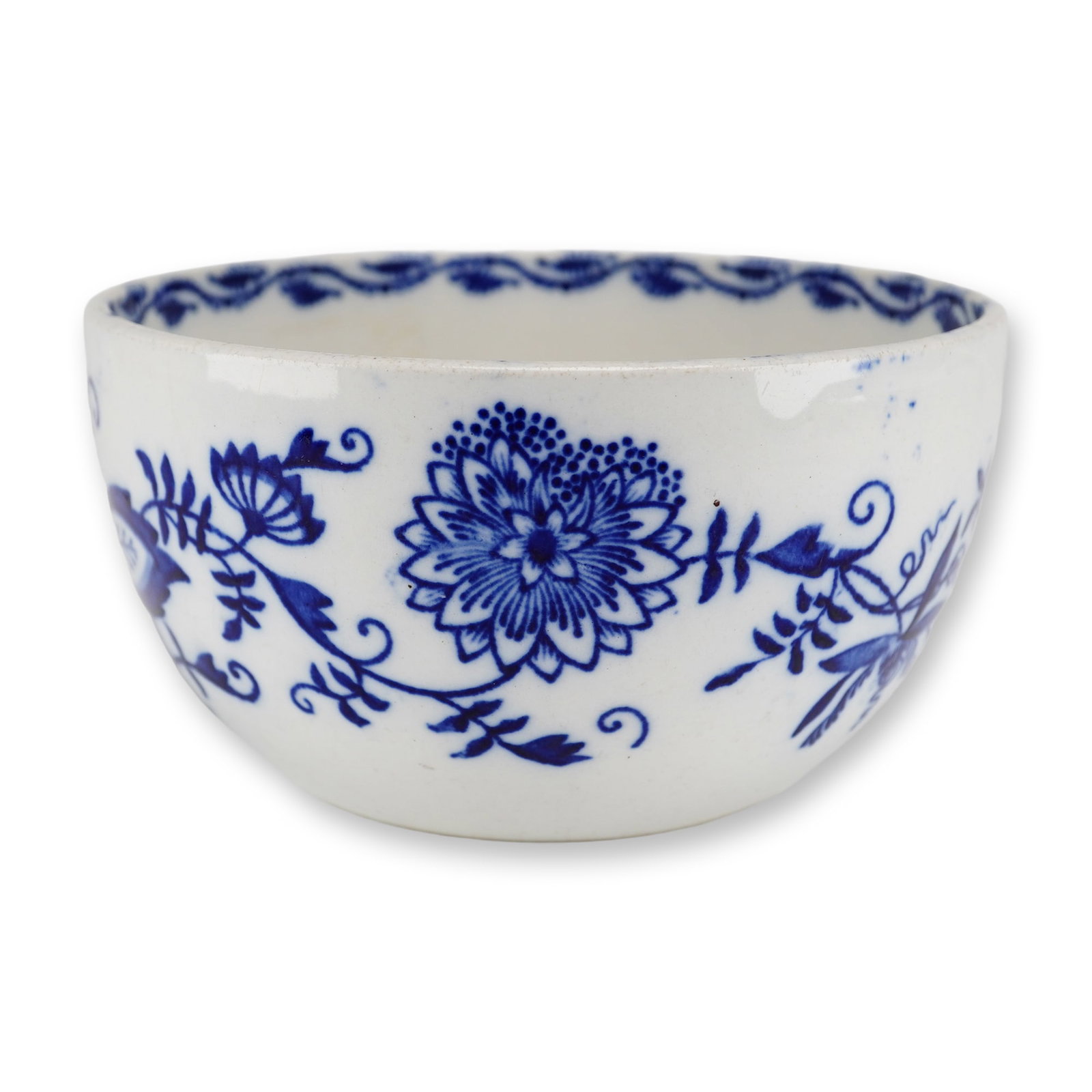 Wedgwood Etruria Blue Onion Pattern Transferware Bowl: This deep circular bowl is made of earthenware and features the Blue Onion pattern. The decoration is applied via blue transfer-printing and includes stylized floral and foliate motifs such as peonies