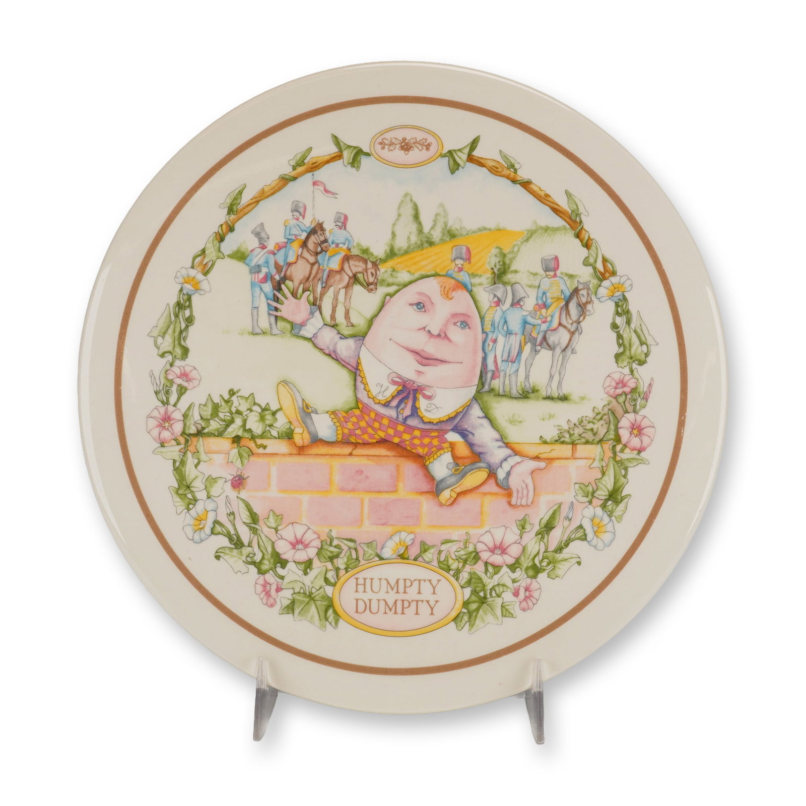 Wedgwood 1987 Nursery Rhymes Humpty Dumpty Porcelain Wall Plaque: This porcelain plaque was manufactured by Wedgwood in 1987 and is identified as the second in a series of five popular Nursery Rhymes. The circular plaque features a multi-color transfer-printed centr