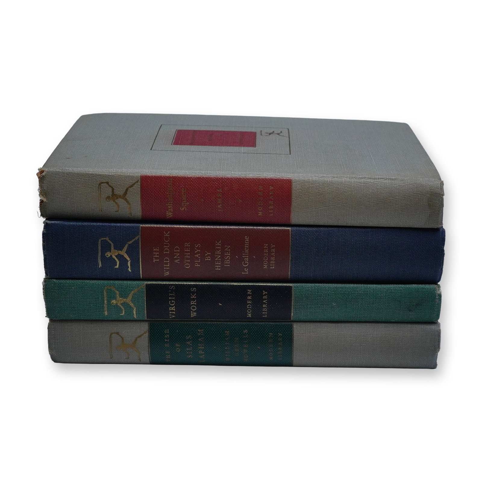 4pc Volumes from The Modern Library Classics Series: A group of four vintage hardcover editions published by The Modern Library, New York, featuring landmark literary works in compact, collectible format. This lot includes Washington Square by Henry Jam
